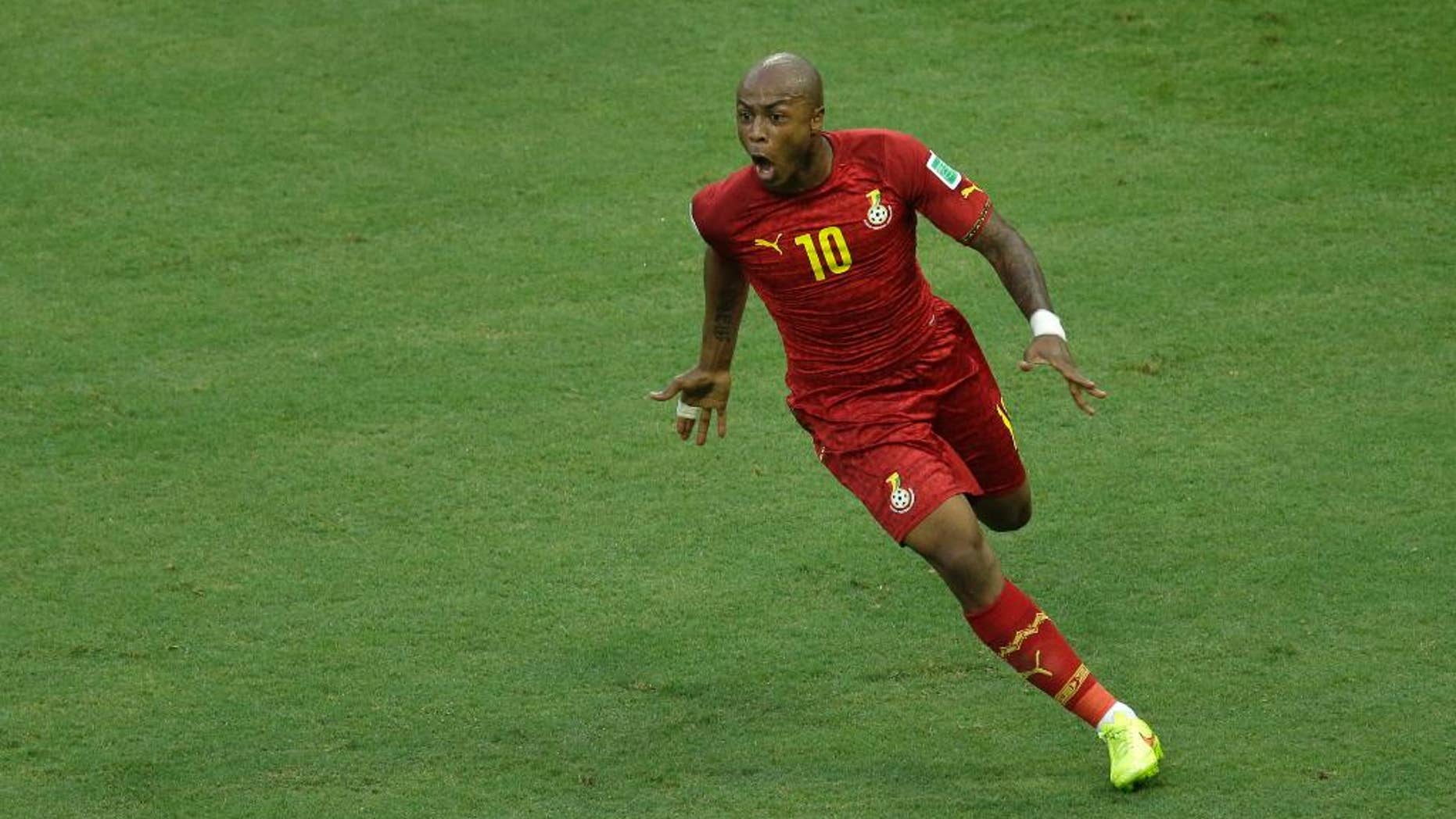 Ghana's Andre Ayew celebrates scoring his side's first goal during the group G World Cup soccer match between Germany and Ghana at the Arena Castelao in Fortaleza, Brazil, Saturday, June 21, 2014. (AP Photo/Themba Hadebe)