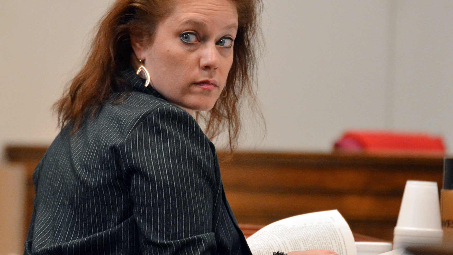 April 1, 2014: In this photo, Stephanie Irene Greene sits in court during her trial at the Spartanburg County Courthouse, in Spartanburg, S.C.