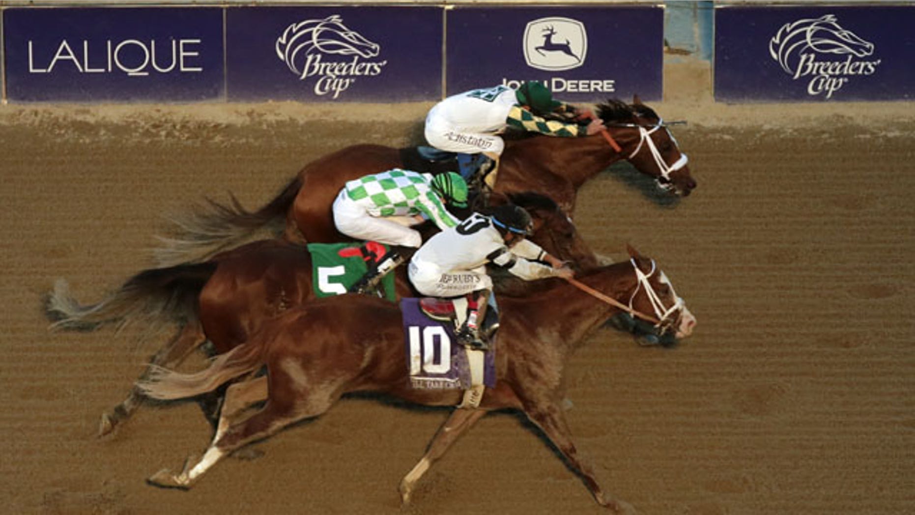 November 2, 2013: Jockey Gary Stevens, top, rides Mucho Macho Man to victory in the Breeders' Cup Classic horse race ahead of Will Take Charge, bottom, and Declaration of War at Santa Anita Park. (AP Photo/Jae C. Hong)