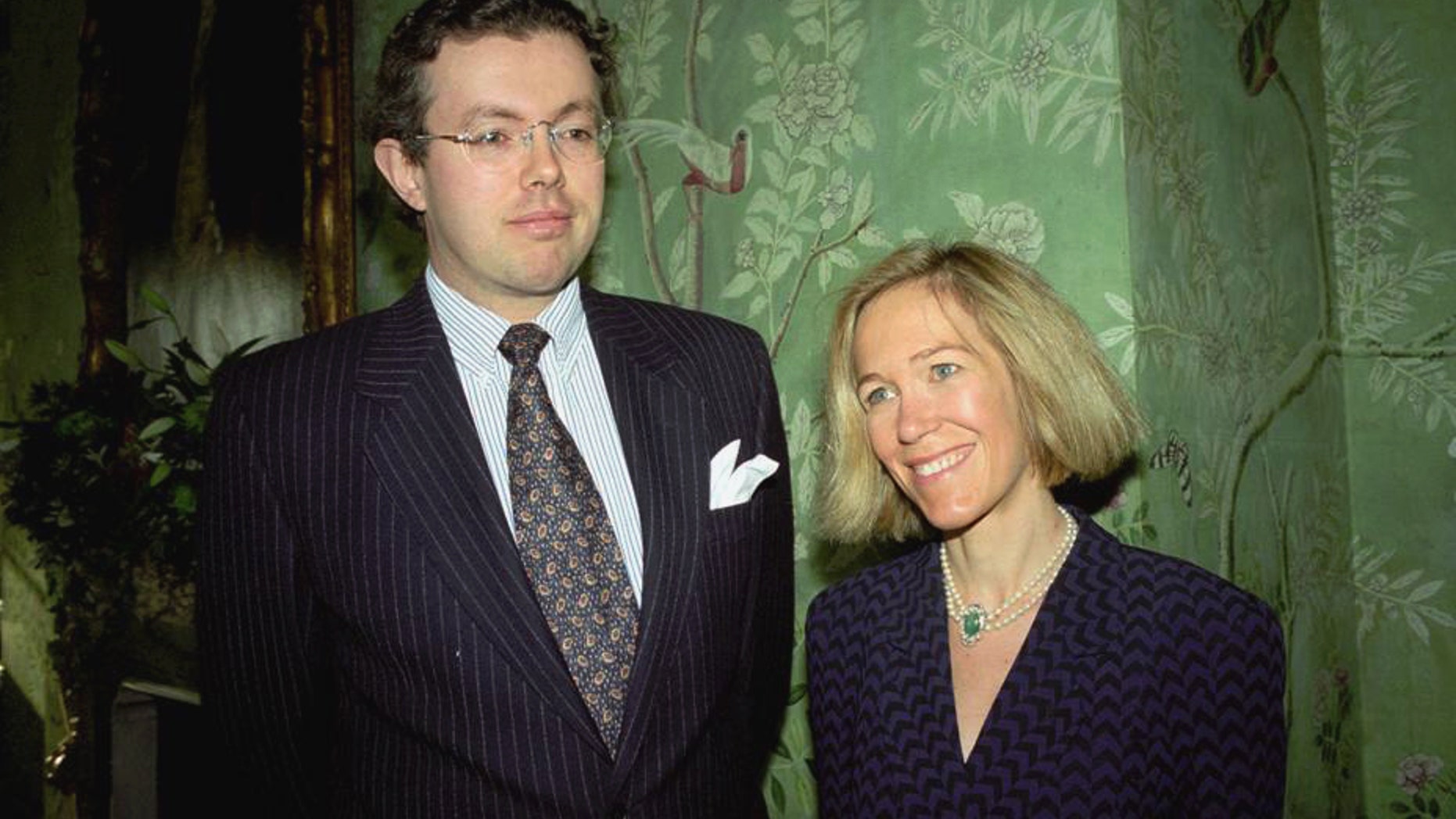 This photo of Nov. 26, 1996 shows Eva Rausing, right, and her husband Hans Kristian Rausing at Winfield House, London, the residence of the US ambassador to the UK attending the Glamour America Fashion Show and lunch. One of Britain's richest women, American-born Eva Rausing, was found dead in her west London home and a man was arrested in connection with the case, British police say, adding that an autopsy had failed to uncover a formal cause of death. Rausing, 48, was the wife of Hans Kristian Rausing, heir to the TetraPak fortune his father built by creating a successful manufacturer of laminated cardboard drink containers. (AP Photo/Alan Davidson/The Picture Library Ltd)