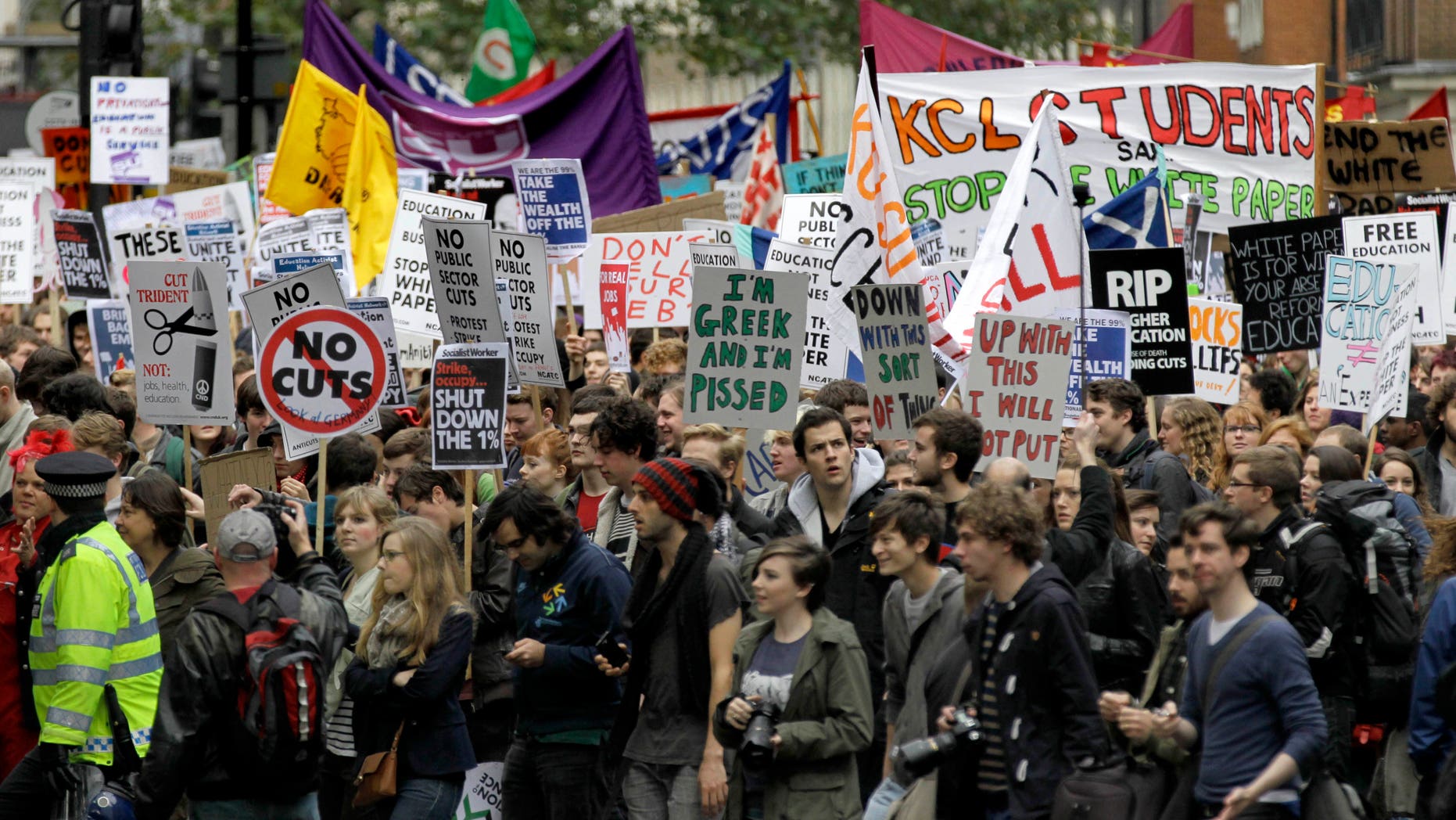 Nov. 9, 2011: Students and campaigners march through the streets of London to protest against higher tuition fees and government cuts.