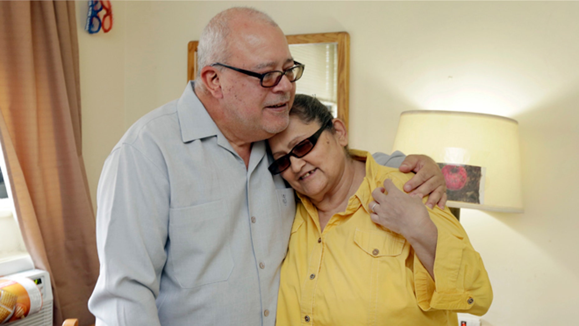 Carmen and Ricardo Ramire at the Bronxwood Home for the Aged, in the Bronx borough of New York.