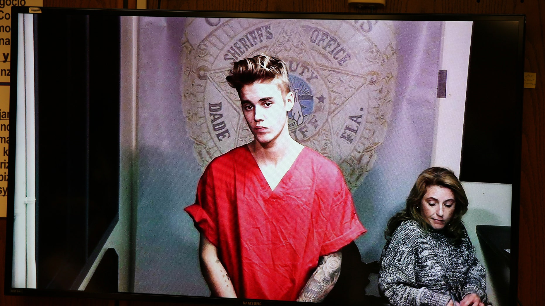 Justin Bieber appears in court via video feed, Thursday, Jan. 23, 2014, in Miami.