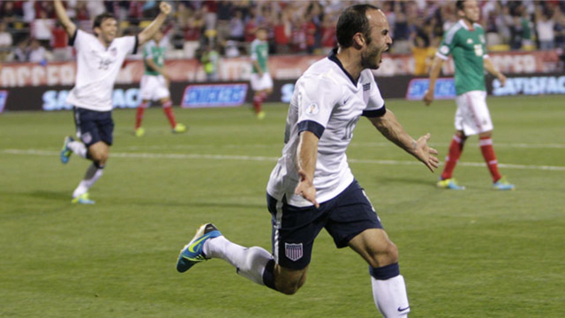September 10, 2013: Landon Donovan celebrates his goal against Mexico during the second half of a World Cup qualifying soccer match in Columbus, Ohio. The United States defeated Mexico 2-0. (AP Photo/Jay LaPrete)