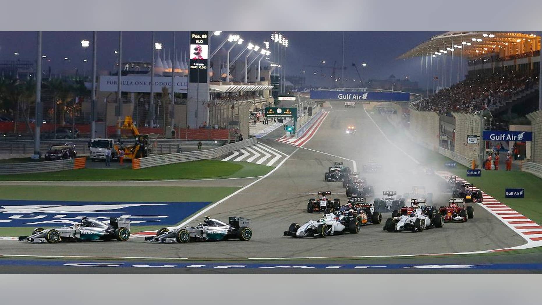 Mercedes driver Nico Rosberg of Germany leads the field after the start during the Bahrain Formula One Grand Prix at the Formula One Bahrain International Circuit in Sakhir, Bahrain, Sunday, April 6, 2014. (AP Photo/Hassan Ammar)