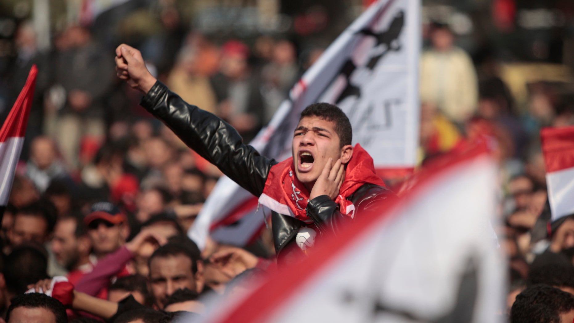 Feb. 2, 2012: An Egyptian soccer fan shouts anti-ruling military council slogans during a protest at Sphinx square in Cairo, Egypt, against killing of at least 74 people in the country's worst ever soccer violence.