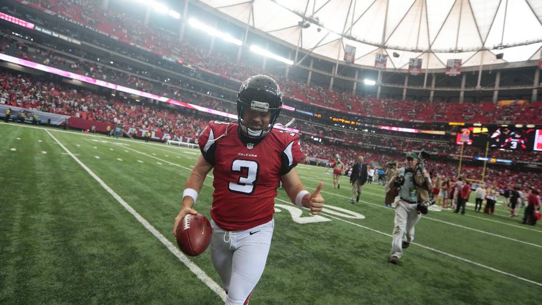 Atlanta Falcons kicker Matt Bryant (3) walks off the field after kicking the game-winning field goal against the New Orleans Saints during overtime of an NFL football game, Sunday, Sept. 7, 2014, in Atlanta. The Atlanta Falcons won in overtime 37-34. (AP Photo/John Bazemore)