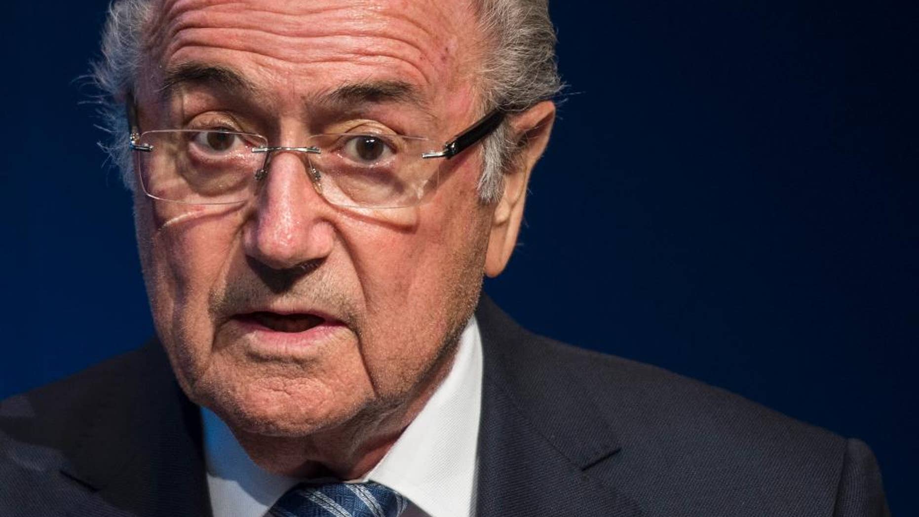 FIFA President Sepp Blatter speaks during a news conference at the FIFA headquarters in Zurich, Switzerland, Tuesday, June 2, 2015. Sepp Blatter says he will resign from his position amid corruption scandal and is promising to call for fresh elections to choose a successor. (Ennio Leanza/Keystone via AP)