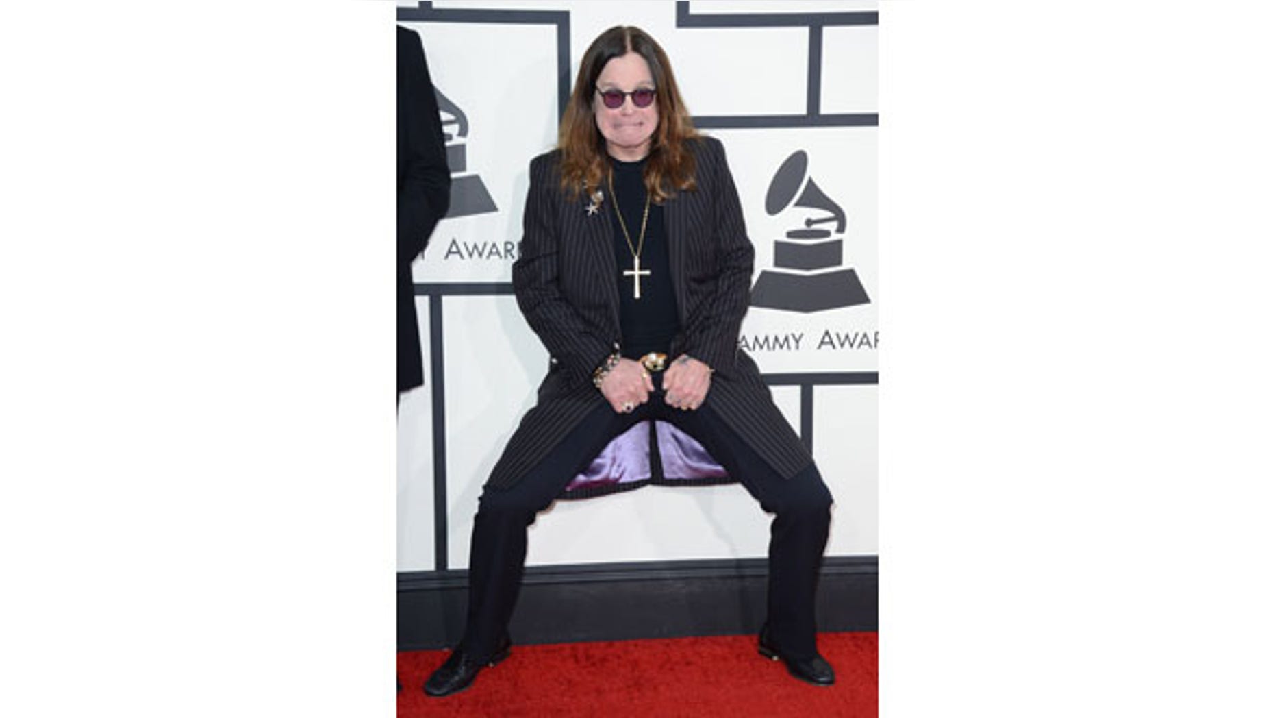 January 26, 2014: Ozzy Osbourne arrives at the 56th annual Grammy Awards at Staples Center in Los Angeles. (Photo by Jordan Strauss/Invision/AP)