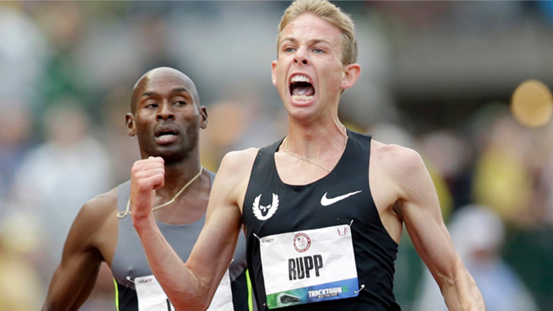 June 28, 2012: Galen Rupp celebrates after finishing first in the men's 5,000 meter finals at the U.S. Olympic Track and Field Trials in Eugene, Ore.