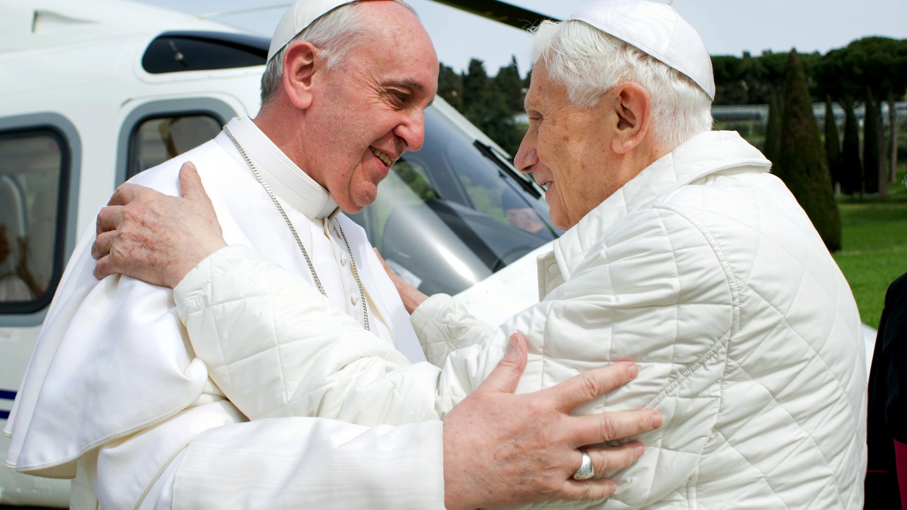 March 23, 2013: In this photo provided by the Vatican paper L'Osservatore Romano, Pope Francis meets Pope emeritus Benedict XVI in Castel Gandolfo.