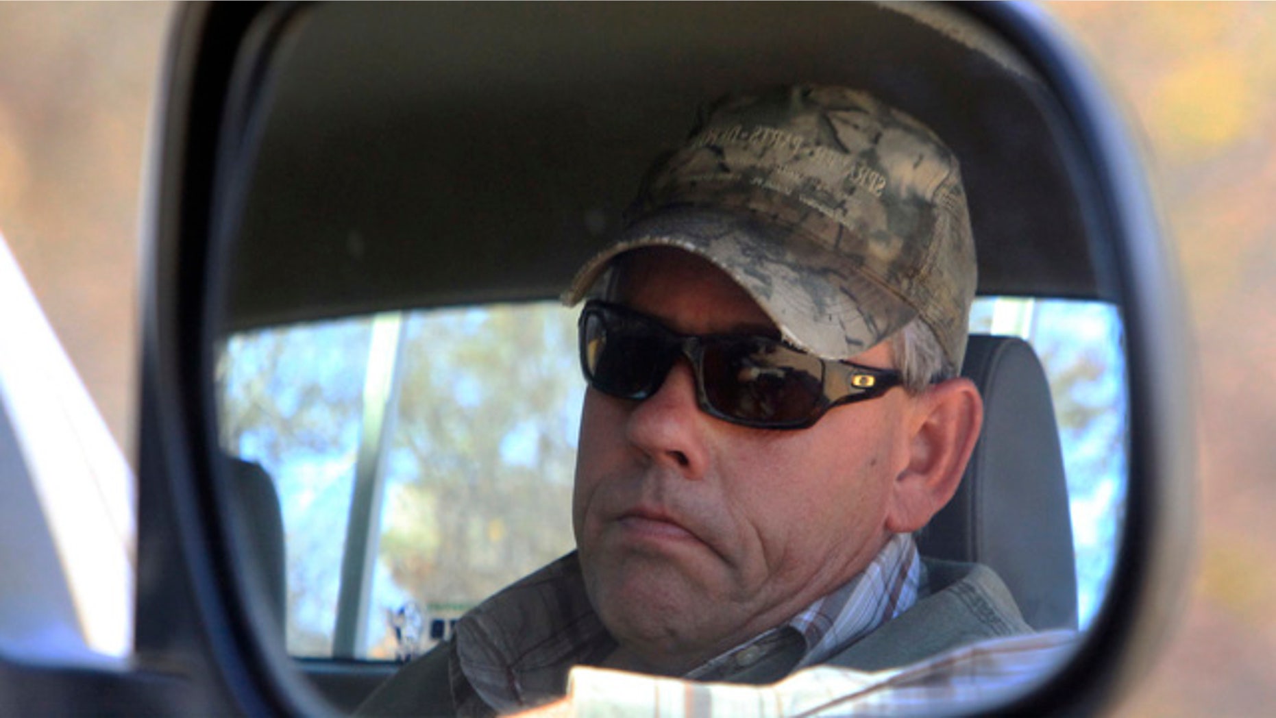 Aug. 5, 2015: Professional hunter Theodore Bronkhorst sits in his car upon his arrival at the magistrates courts to face trial in Hwange about 435 miles south west of Harare, Zimbabwe. (AP Photo/Tsvangirayi Mukwazhi)