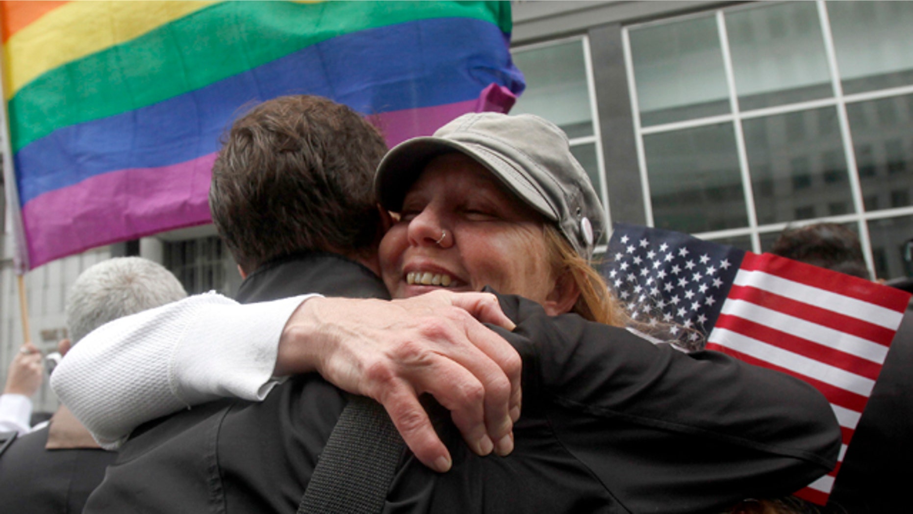 Aug. 4, 2010: Sheree Red Bornand, right, hugs Aidan Dunn after hearing the decision in the United States District Court proceedings challenging Proposition 8 outside of the Phillip Burton Federal Building in San Francisco.