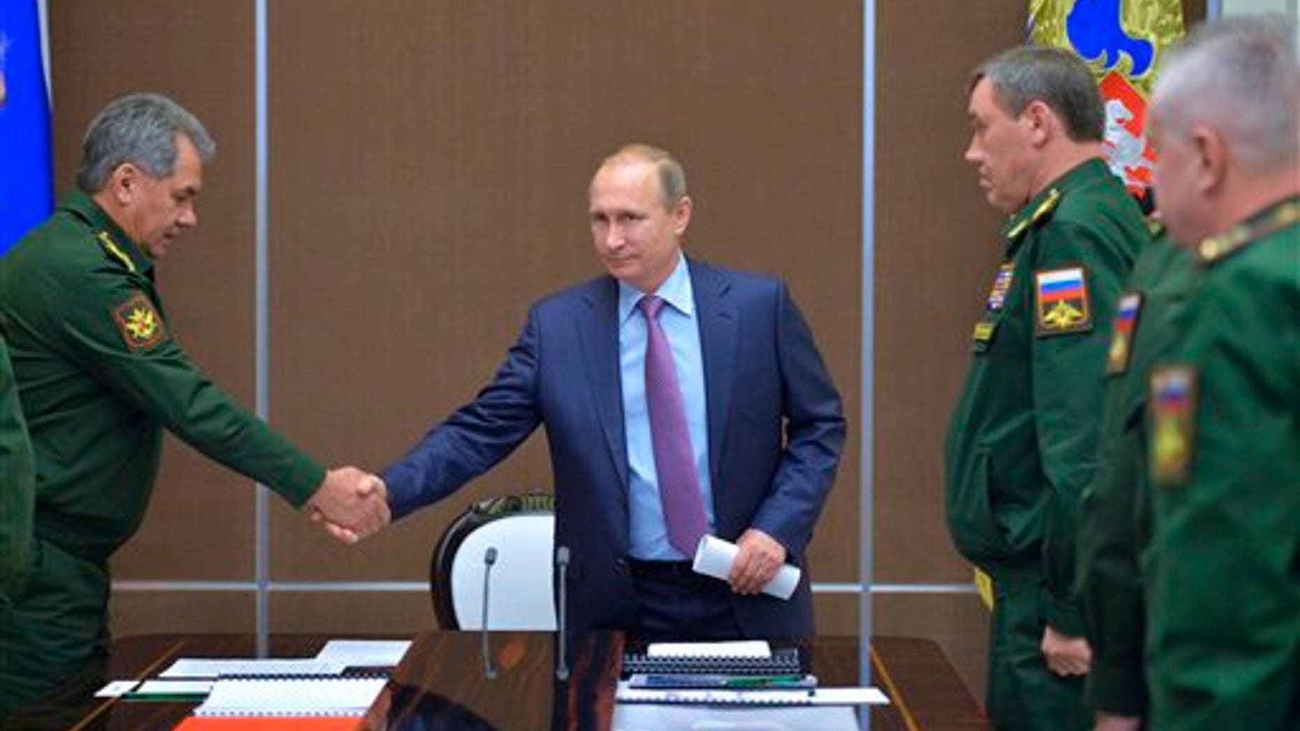 Russian President Vladimir Putin at a meeting with defense officials Tuesday.