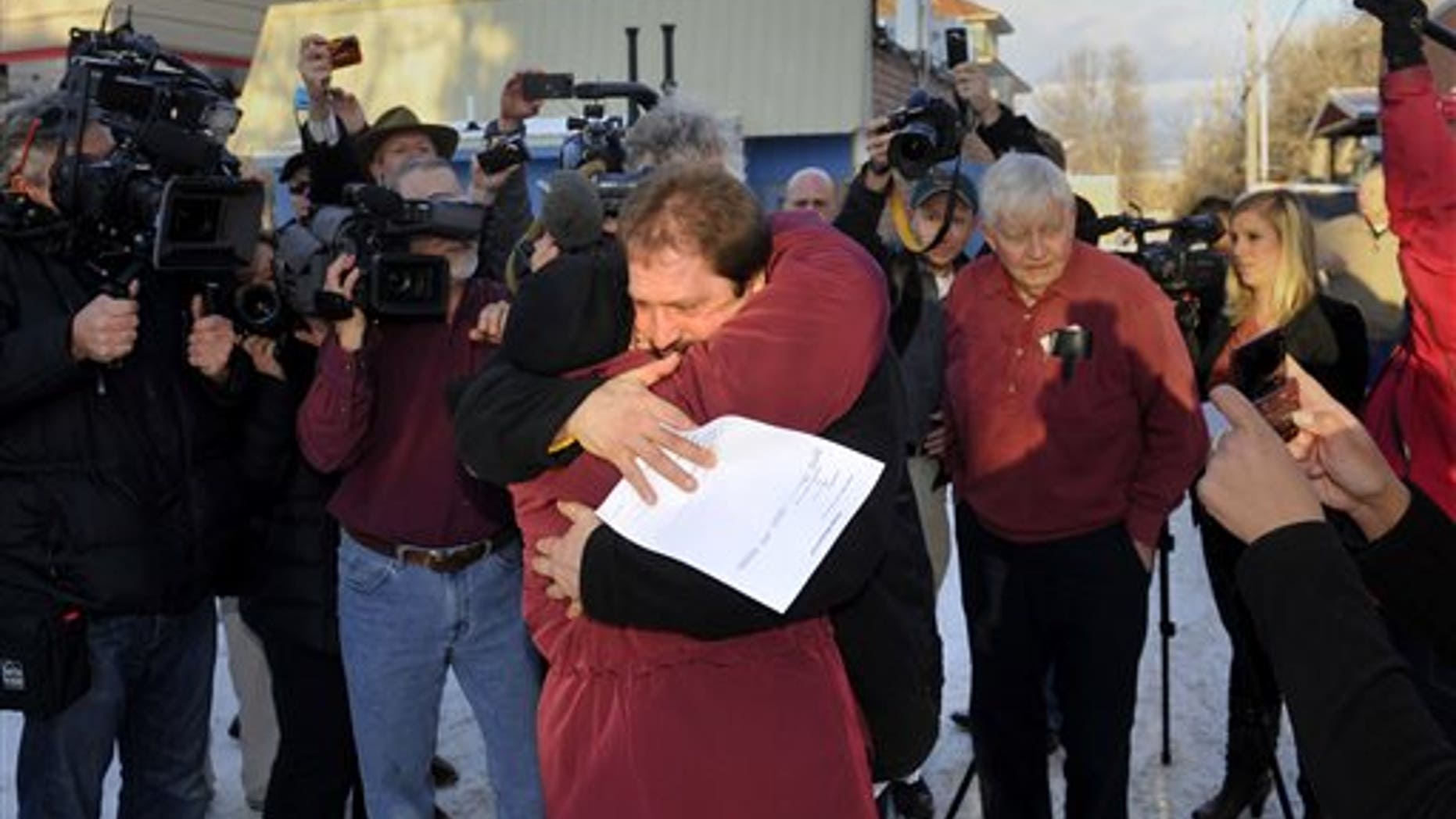 Barry Beach hugs his mother after being released in 2011, before he was sent back to prison.