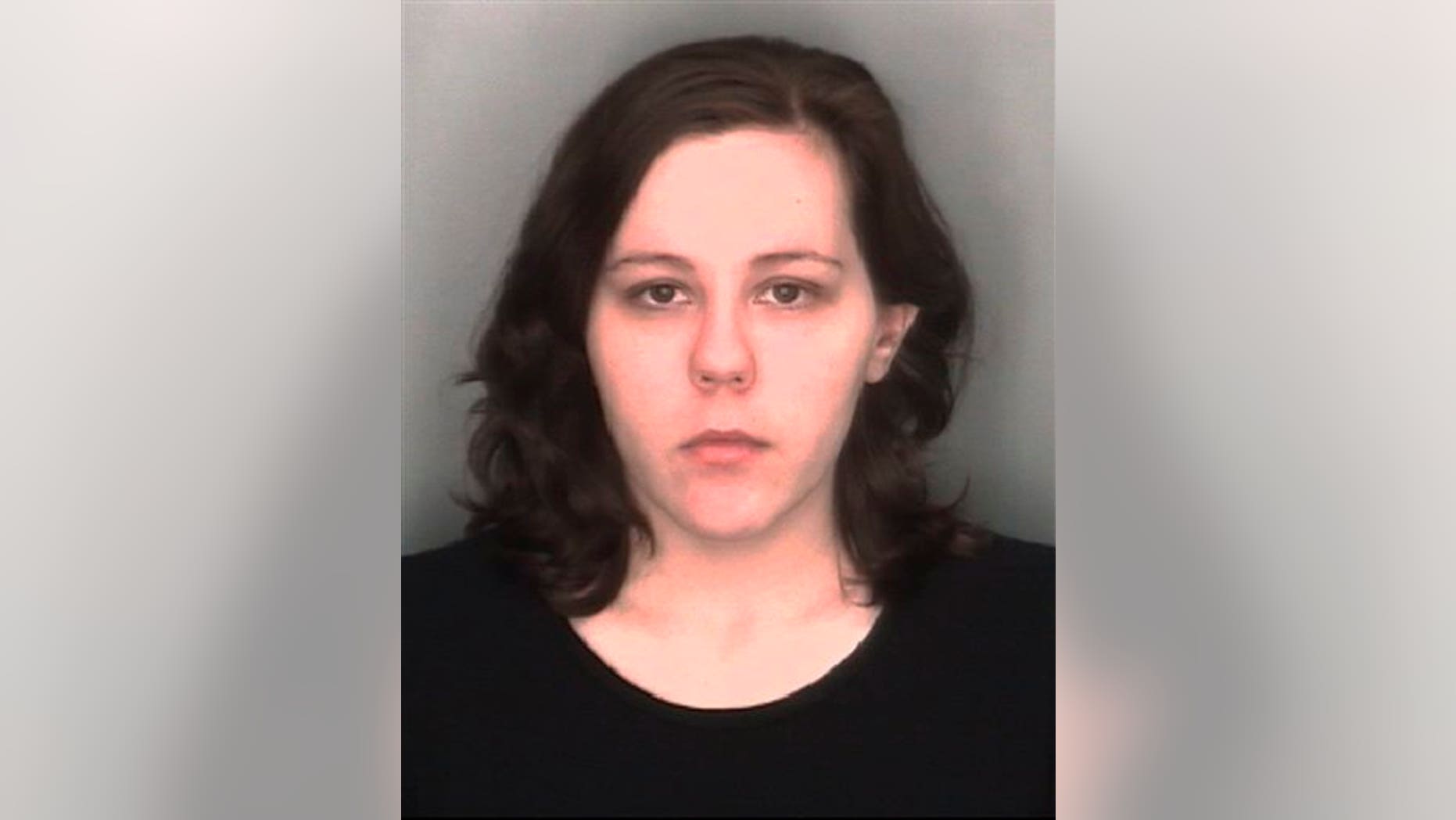 This undated file booking photo released by the Redford Township, Mich., Police Department, shows Kimberly Pappas. (Redford Township Police Department via AP)