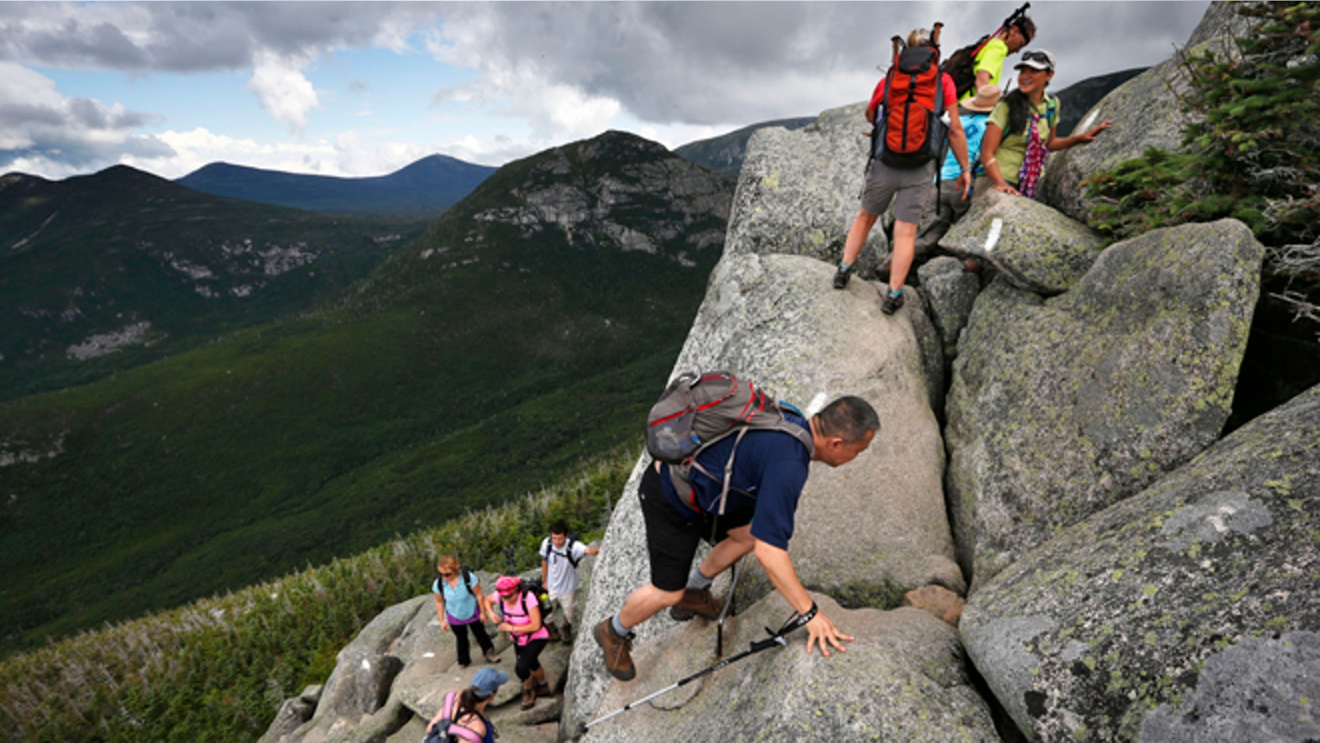 Aug. 7, 2015: Day-hikers scramble over rocky boulders on the Appalachian Trail below the summit of Mt. Katahdin in Baxter State Park in Maine. The sharp rise in the number people using the Appalachian Trail is causing headaches for officials, who say theyre dealing with increasing problems along the 2,189-mile footpath.