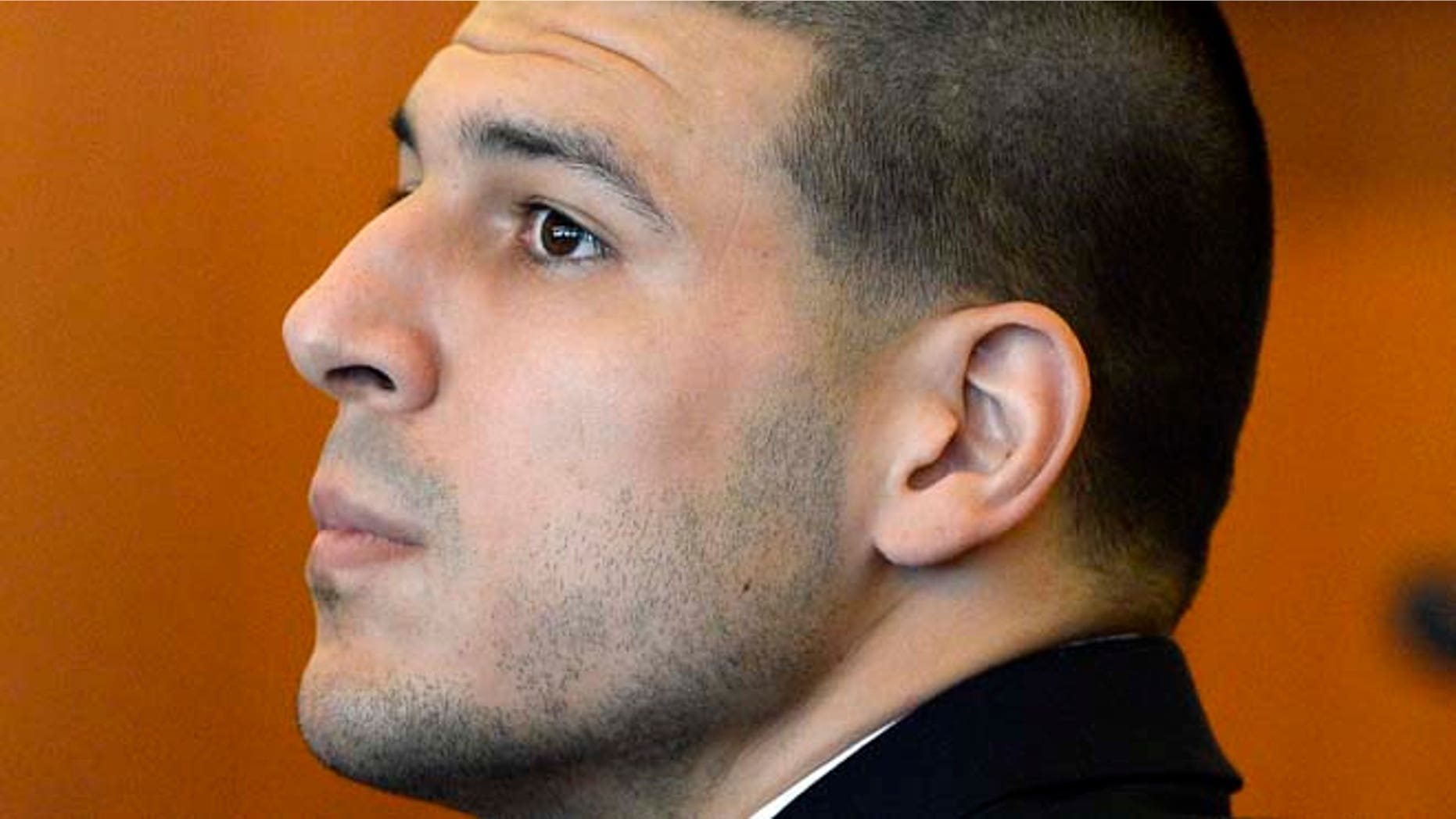 July 22, 2014: In this file photo, former New England Patriots' Aaron Hernandez watches during a hearing in Bristol County Superior Court in Fall River, Mass. (AP)