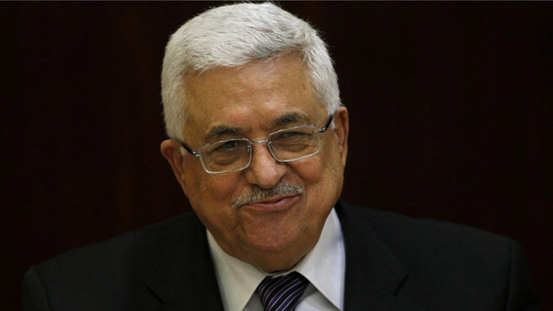 May 11: Palestinian President Mahmoud Abbas smiles during a Palestinian Liberation Organization executive committee meeting in the West Bank city of Ramallah.