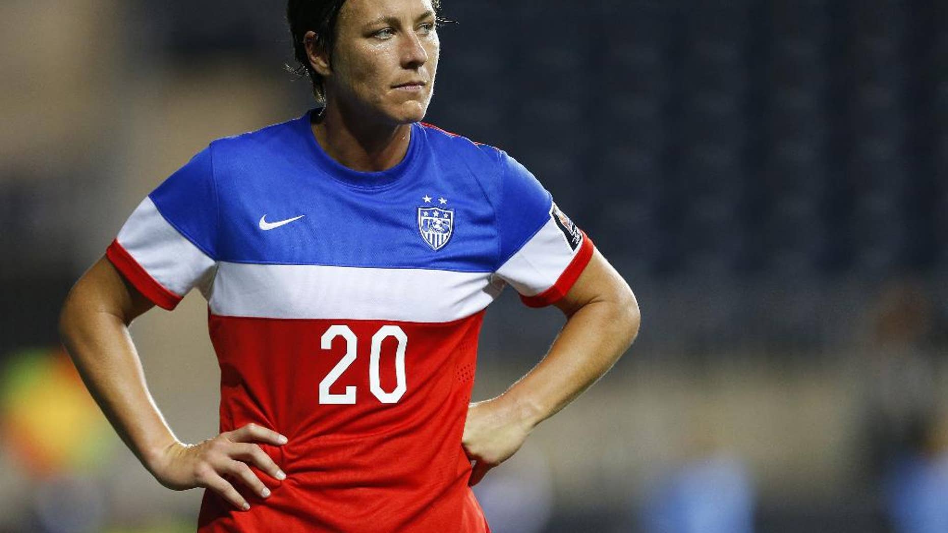 FILE - In this Oct. 26, 2014 file photo, United States forward Abby Wambach (20) stands on the field against Costa Rica during the CONCACAF championship soccer match in Chester, Pa. The prolific goal-scorer for the U.S. women's national team will turn 35 just before the World Cup opens in June, 2015. Wambach has often said she considers this her last chance to raise the coveted trophy. (AP Photo/Rich Schultz, File)