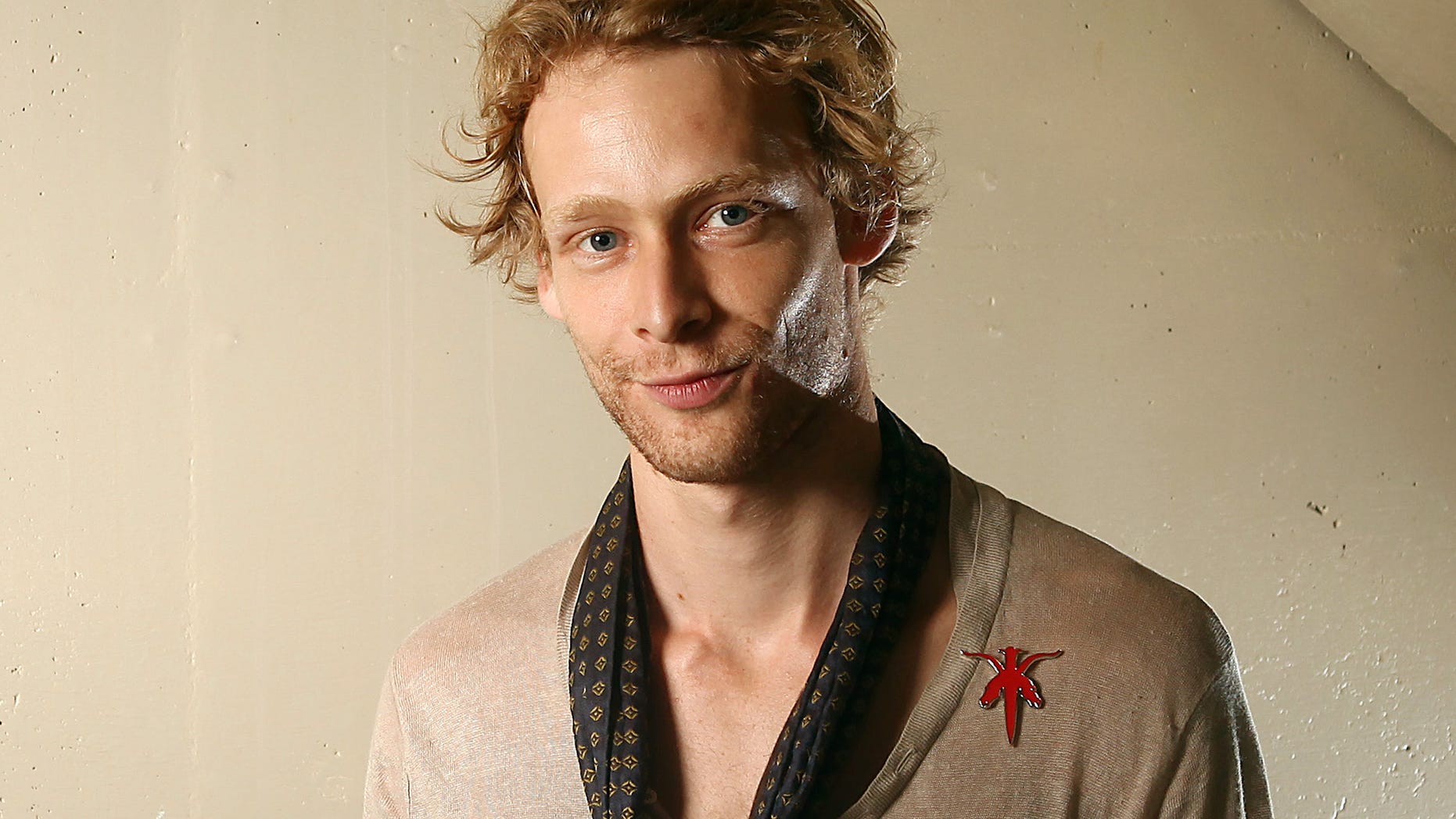 Sept. 14, 2011: File photo shows actor Johnny Lewis posing for a portrait during the 36th Toronto International Film Festival in Toronto, Canada. Authorities say Lewis fell to his death after killing an elderly Los Angeles woman.