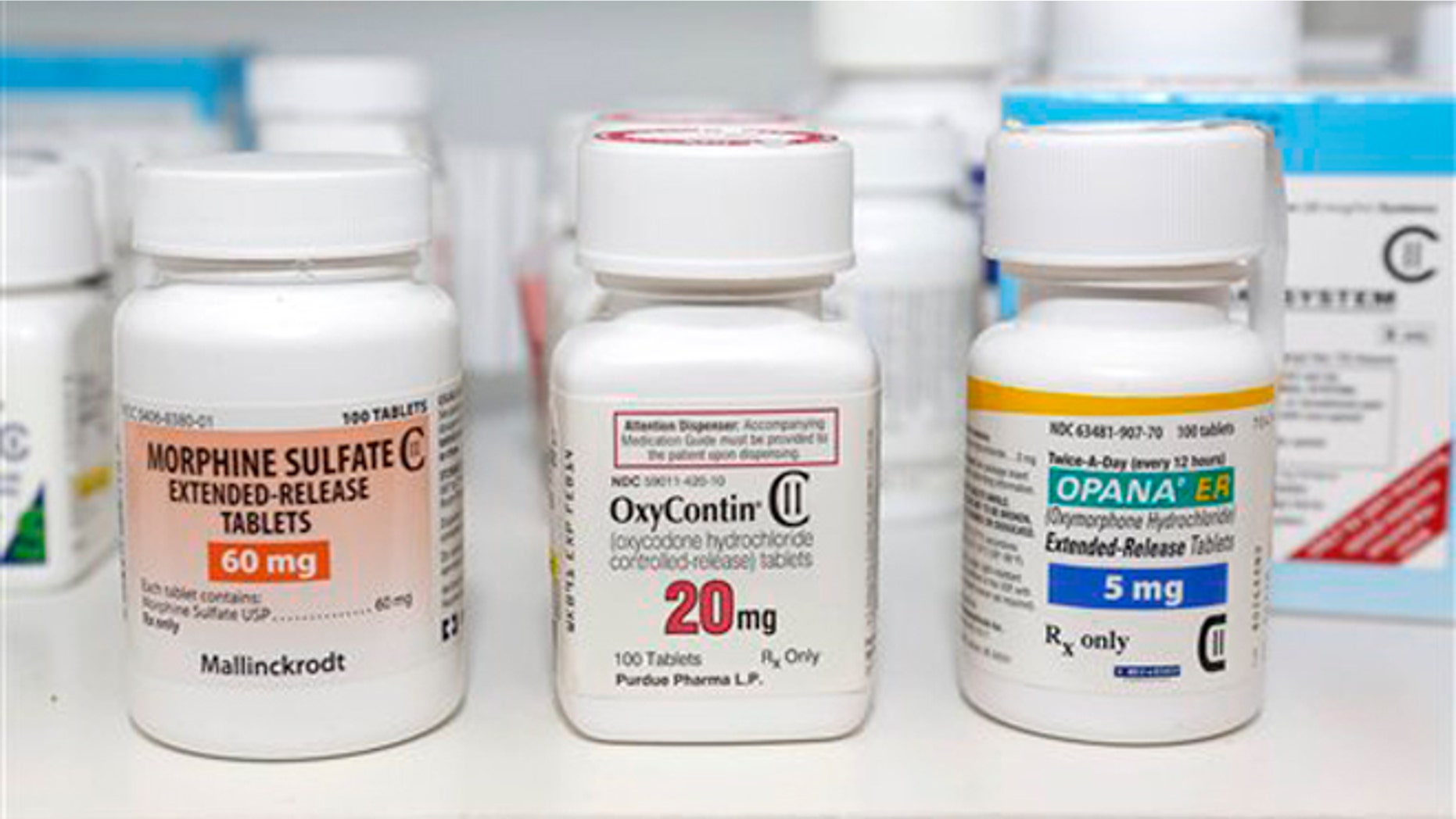 FILE -- Schedule 2 narcotics Morphine Sulfate, OxyContin and Opana are displayed for a photograph in Carmichael, Calif.