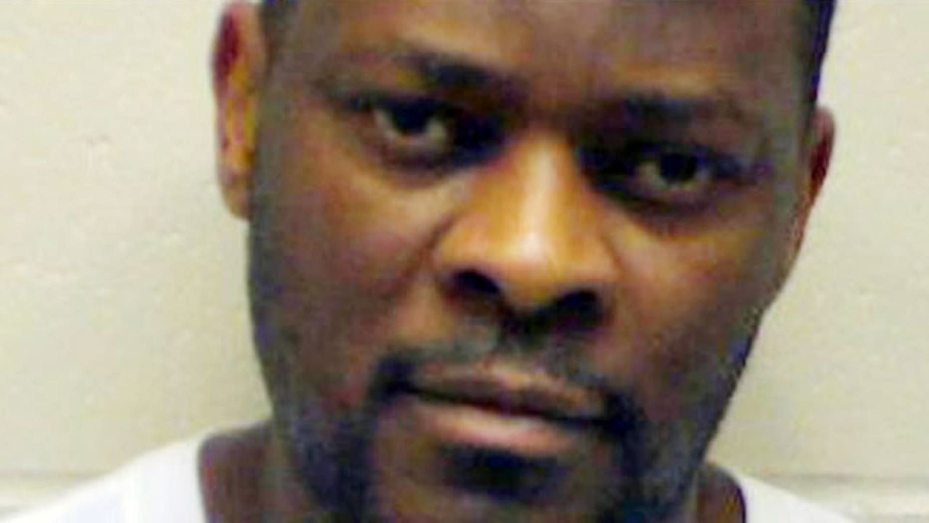 This undated photo provided by the Cass County, N.D., Jail shows Adekunle Adetiloye who was sentenced Monday, Jan. 23, 2012, for his role in what authorities call one of the largest credit card fraud schemes in U.S. history.