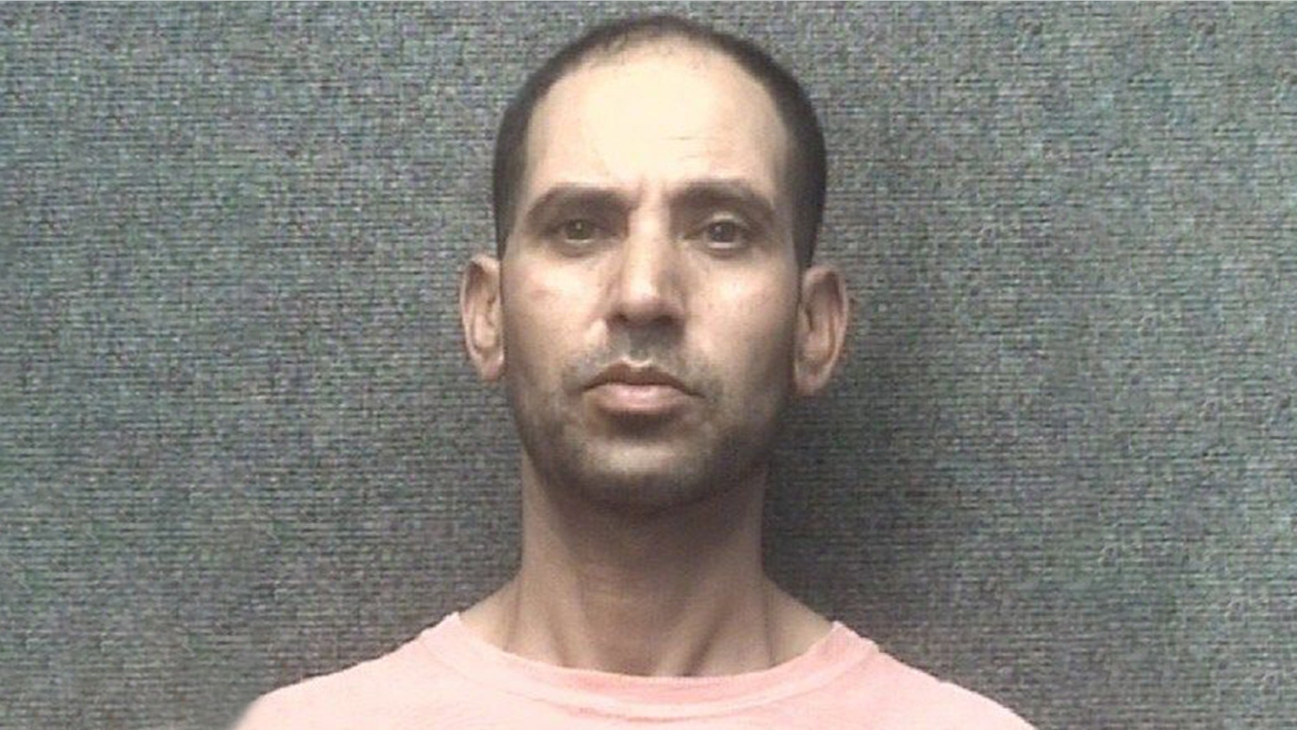 Tuscanini restaurant manager Adel Mansour, 47, reportedly beat a 55-year-old employee with a club.