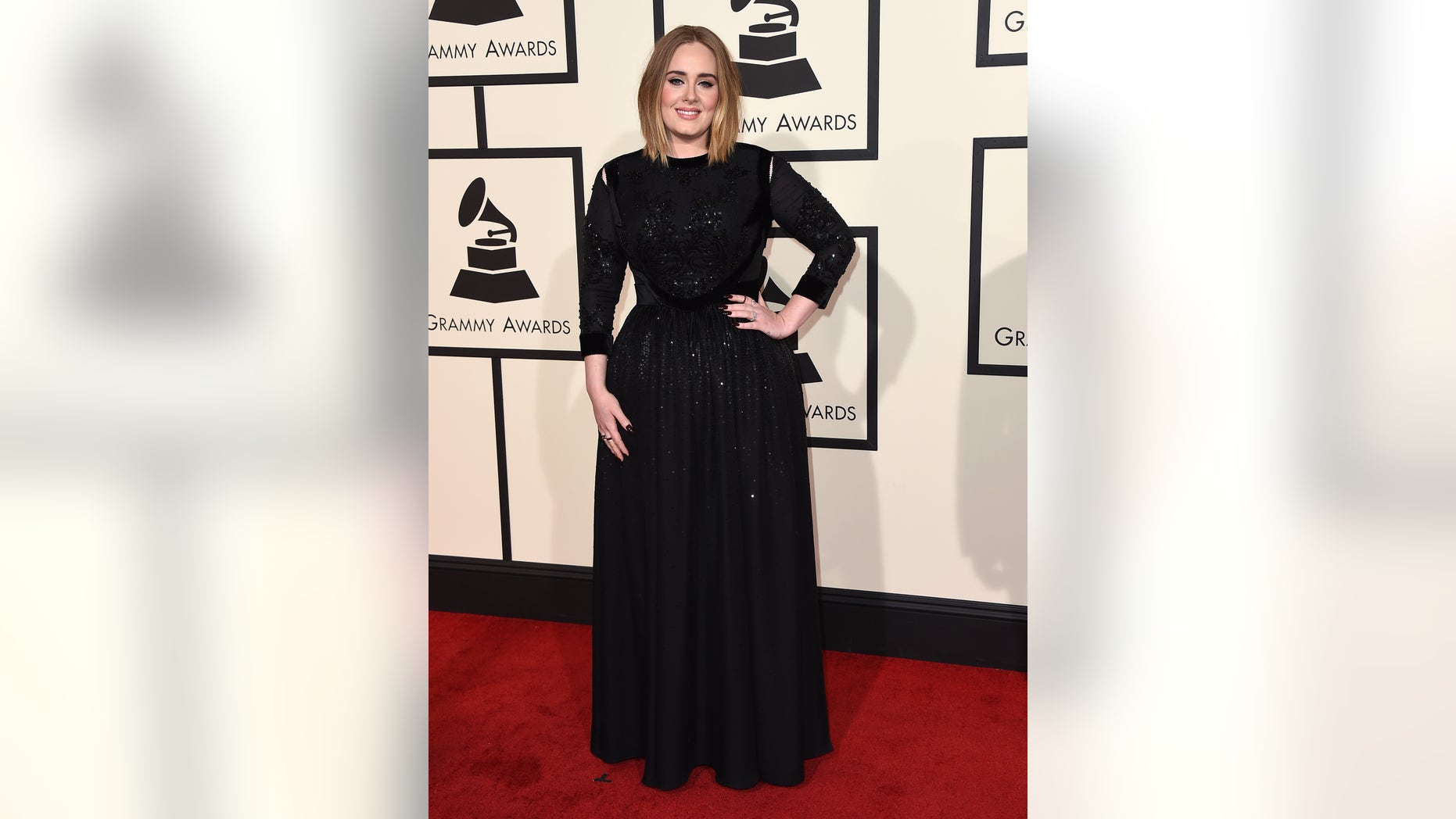 Adele arrives at the 58th annual Grammy Awards at the Staples Center on Monday, Feb. 15, 2016, in Los Angeles. (Photo by Jordan Strauss/Invision/AP)