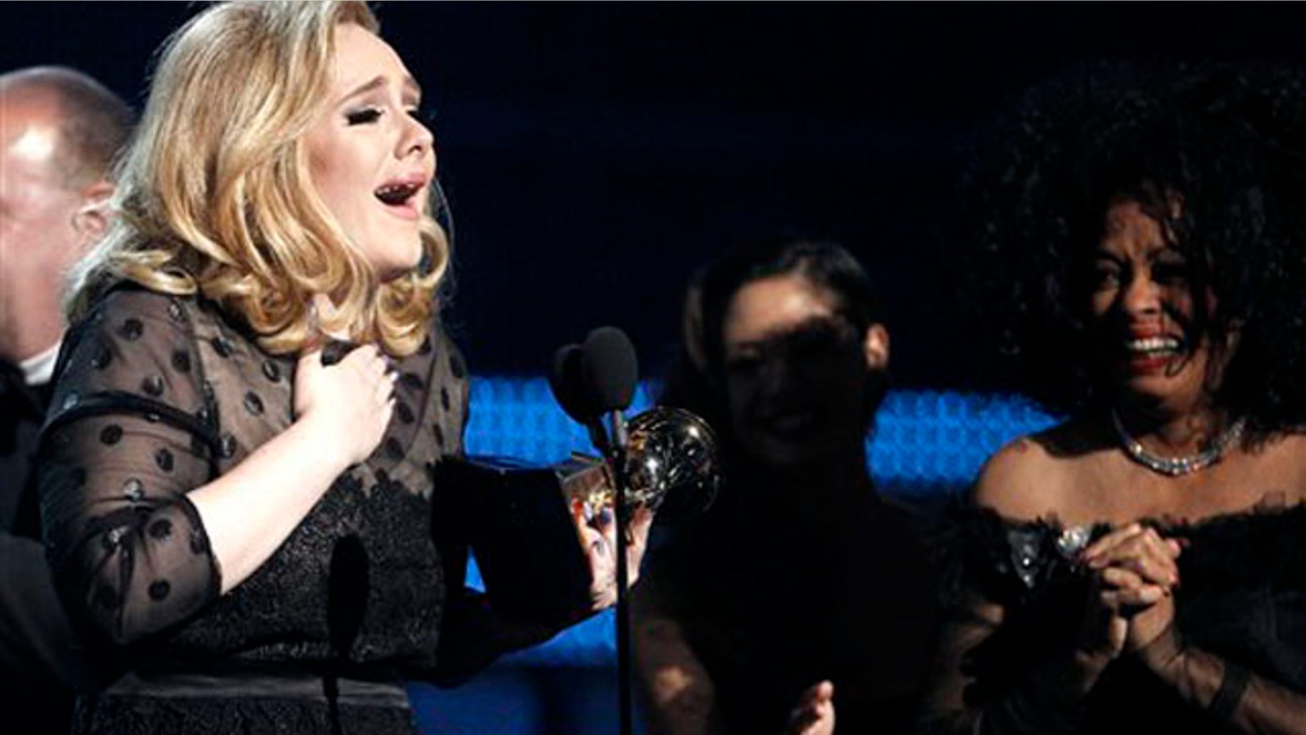 Feb. 12, 2012: Adele accepts the award for record of the year for "Rolling in the Deep" during the 54th annual Grammy Awards.
