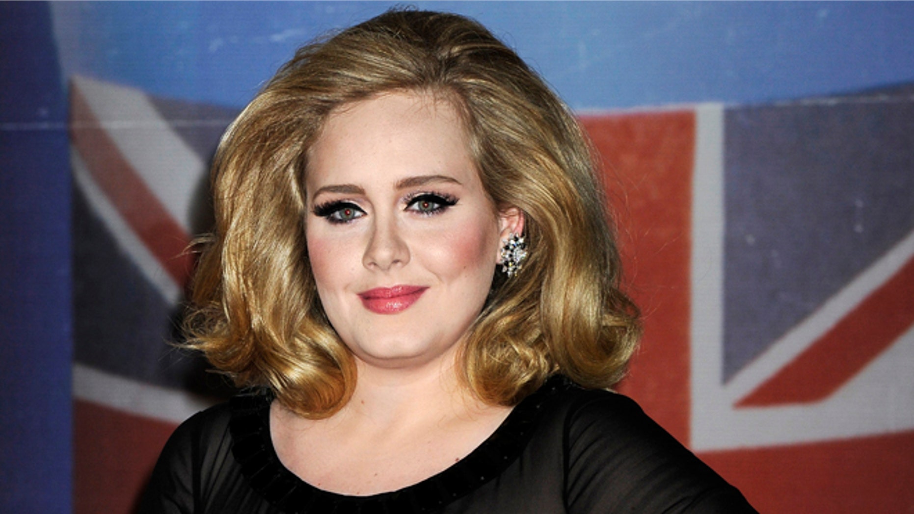 Feb. 21, 2012: In this file photo, performer Adele arrives for the Brit Awards 2012 at the O2 Arena in London.