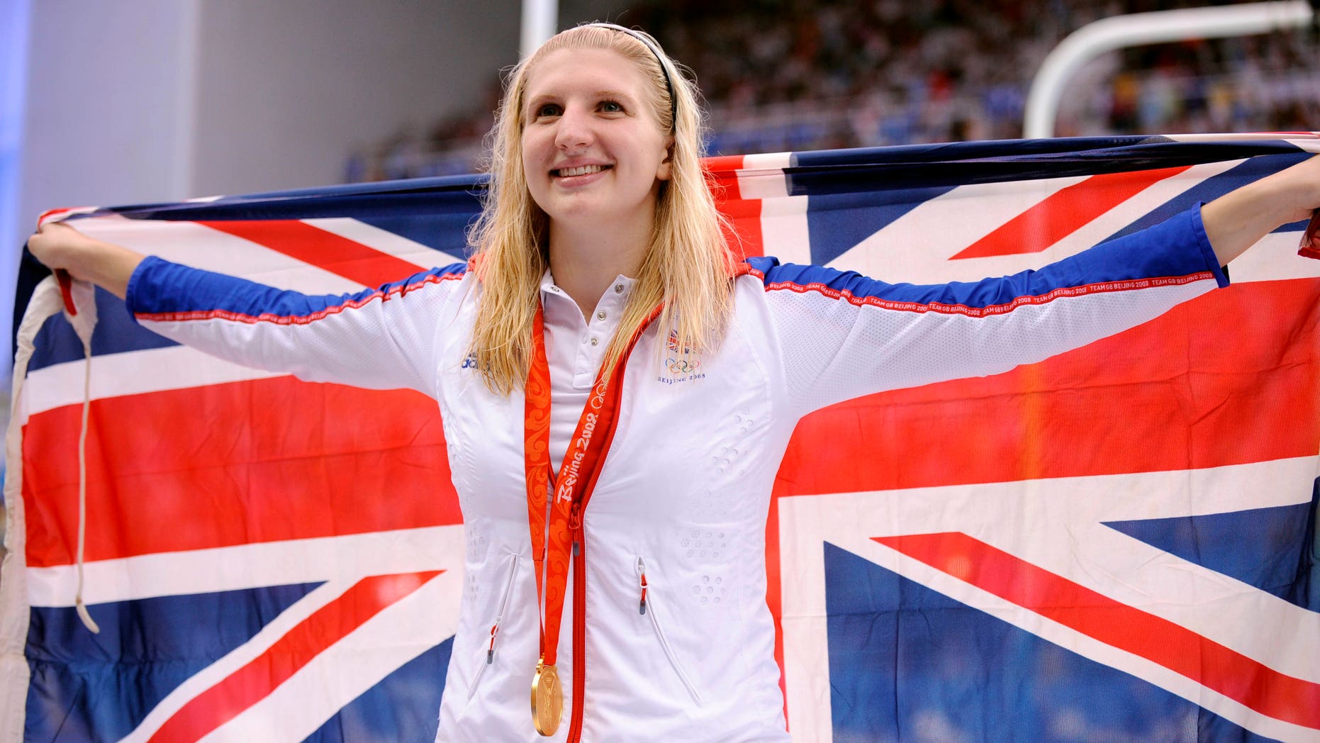 Aug. 16, 2008: In this file photo Britain's Rebecca Adlington shows her gold medal after the women's 800-meter freestyle semi-final during the swimming competitions in the National Aquatics Center at the Beijing 2008 Olympics.