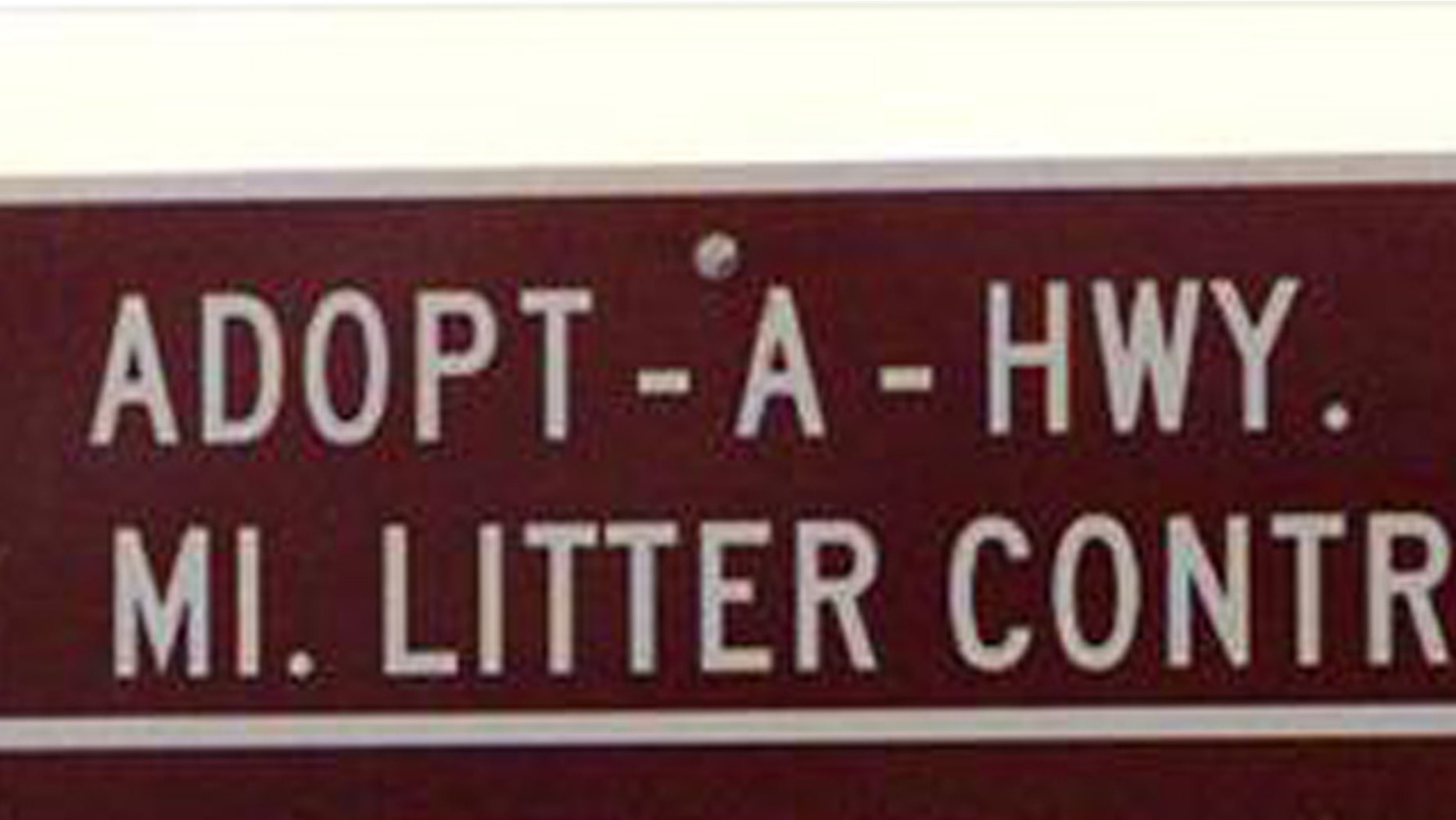 An ADOPT-A-HWY sign in Missouri.