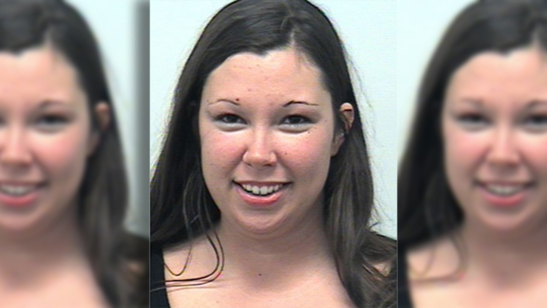 Adriane Moss allegedly locked herself and her son in a hot car for more than an hour, police said.