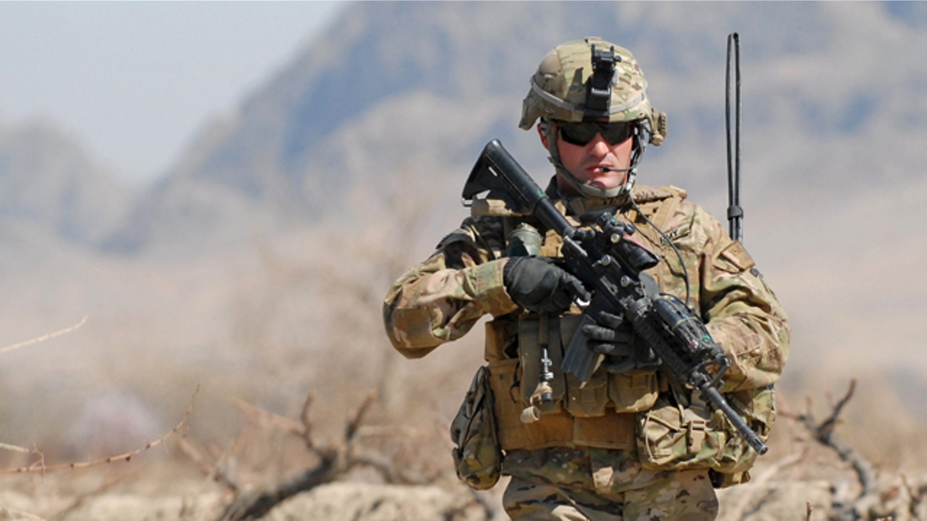 March 8, 2011: Army 1st Sgt. Raymond Dakos patrols near Combat Outpost Kowall in Kandahar, Afghanistan