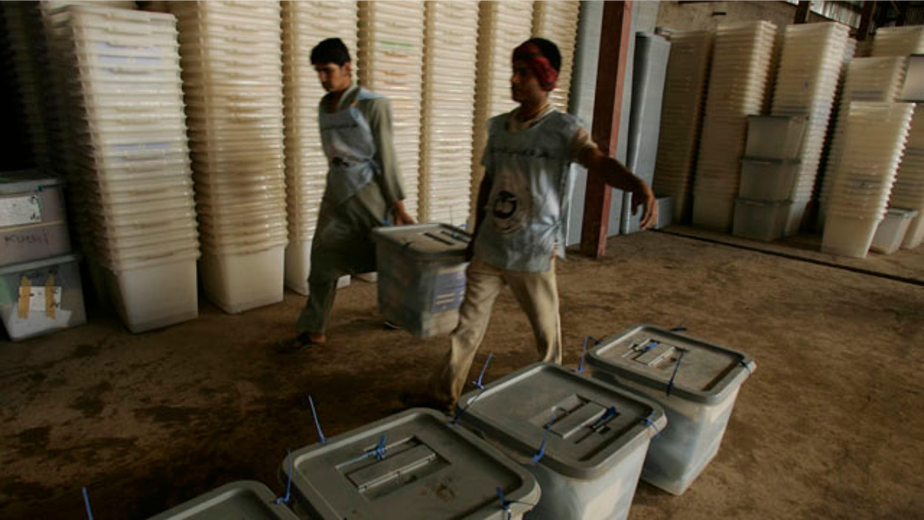 Sept. 19: Afghan election workers stack ballot boxes at Afghanistan's Independent Election Commission in Herat. More than 1 million ballots may be thrown out due to suspicions of fraud.