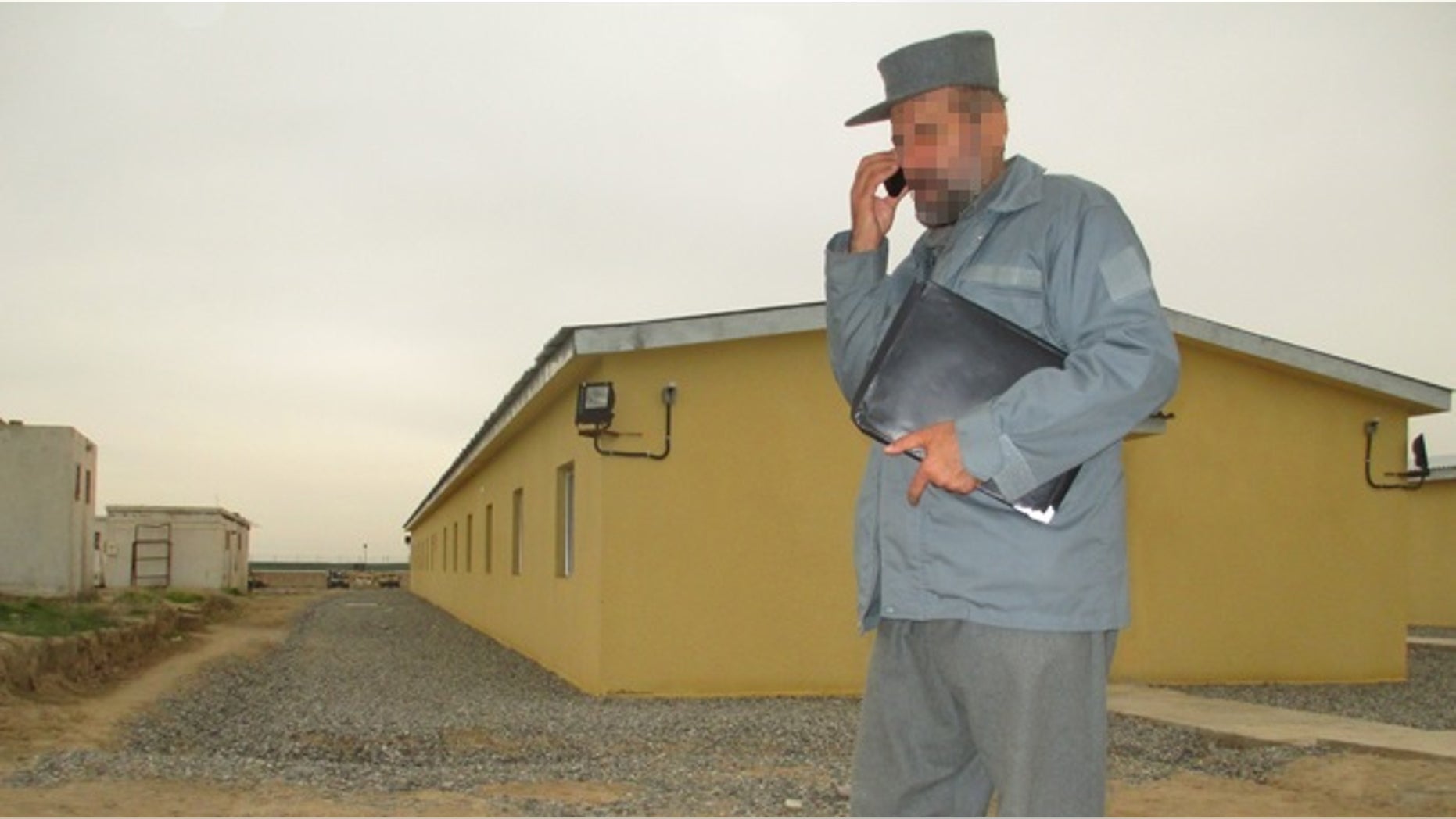 This Afghan army official was stuck with the keys to a new police barracks when the police commander refused to take them because of shoddy construction.