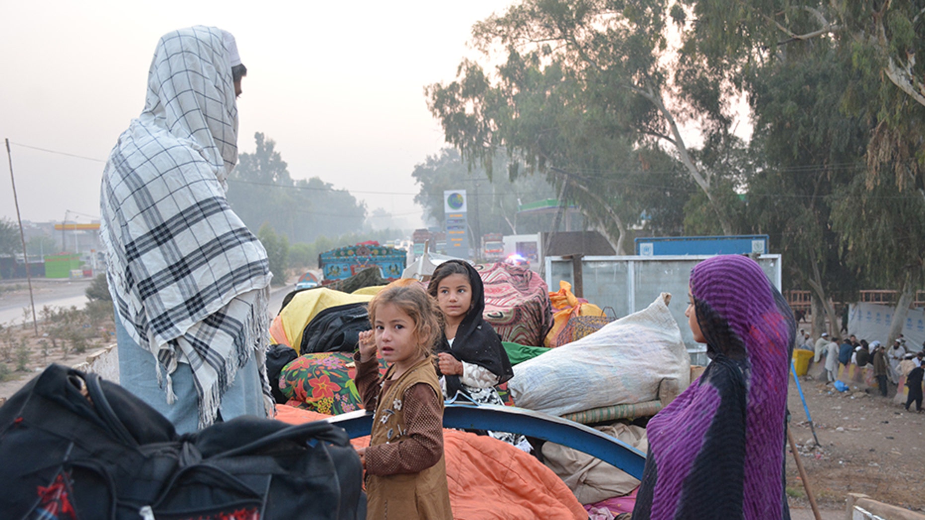 Abdul Rahim and his family, among thousands of returning former refugees who lived in Pakistan, spent the night outside a refugee verification center in Afghanistan.