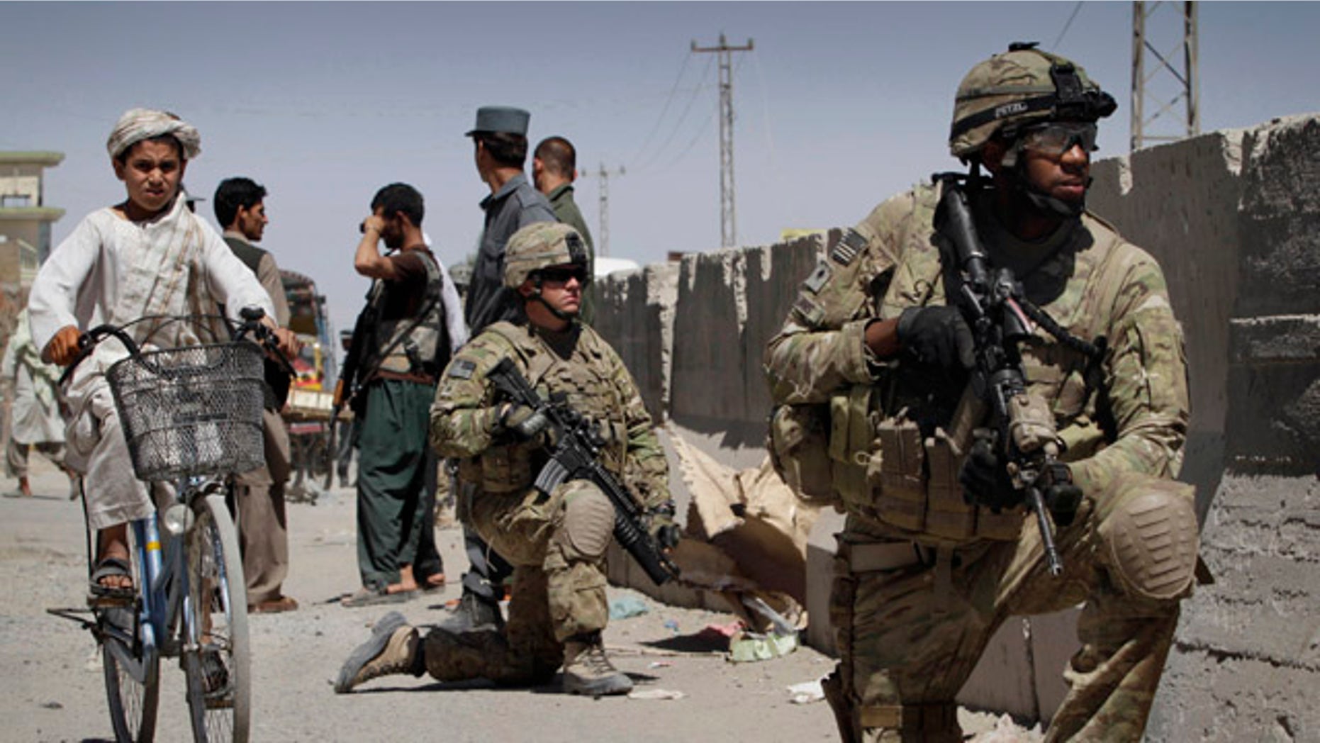 May 22: U.S. soldiers respond to an explosion in Kandahar, Afghanistan where two police officers suffered injuries from a motorcycle with explosives. In a separate incident, NATO says four of its service members have been killed by an explosion in eastern Afghanistan.