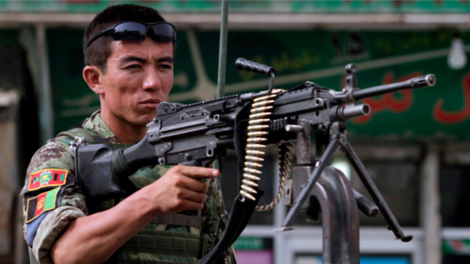 July 4: An Afghan soldier earlier searched for the missing British soldier before he was found dead.