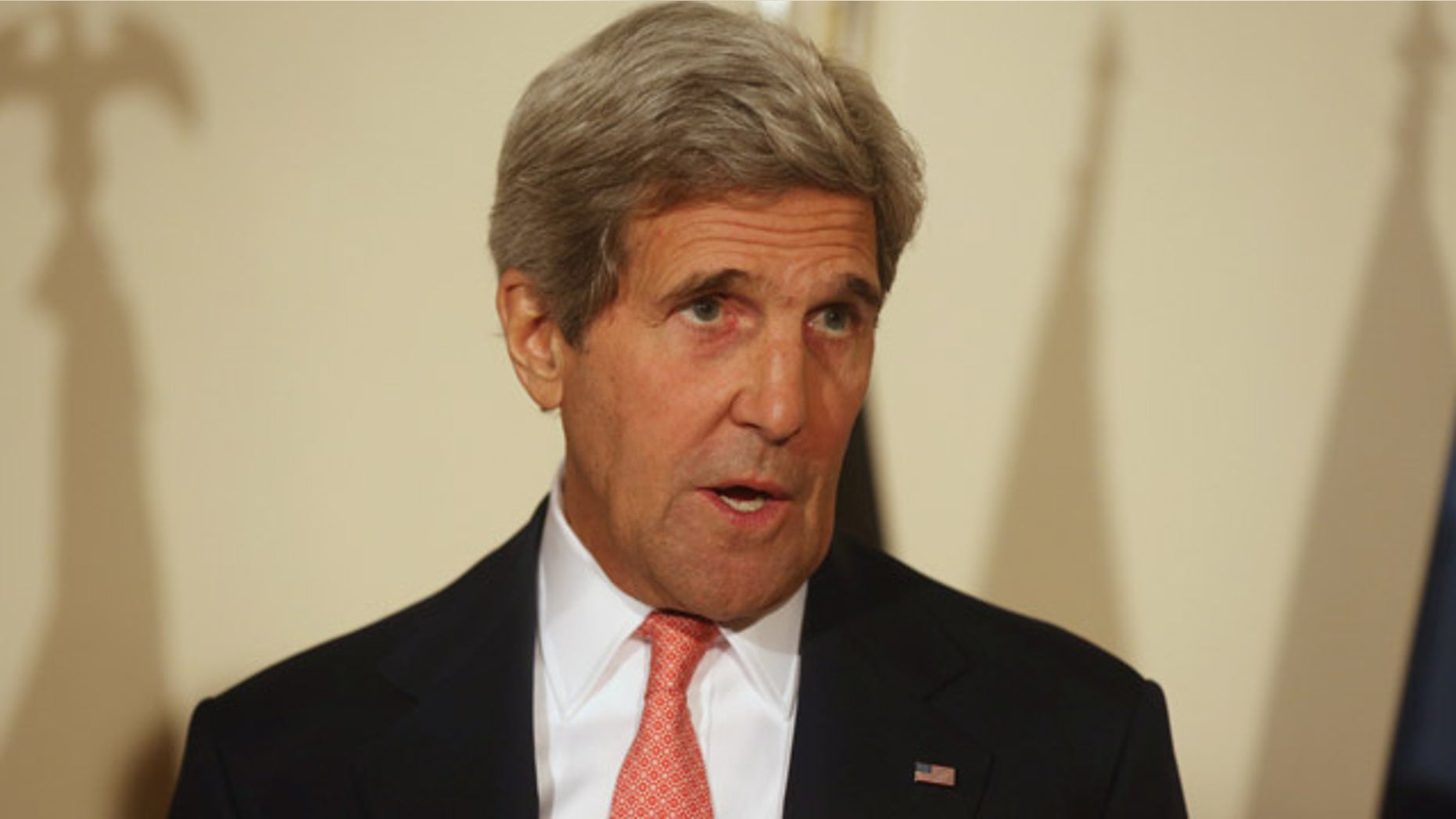 July 12, 2014: U.S. Secretary of State John Kerry speaks during a joint press conference in Kabul, Afghanistan (AP Photo/Rahmat Gul)