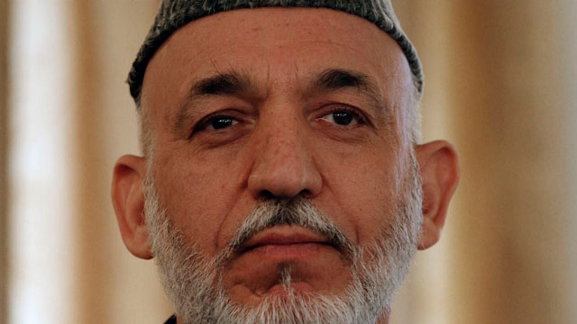 Afghan President Hamid Karzai (pictured) met with Gen. David Petraeus in Kabul for the first time since Karzai called for a drawdown of NATO military activities.