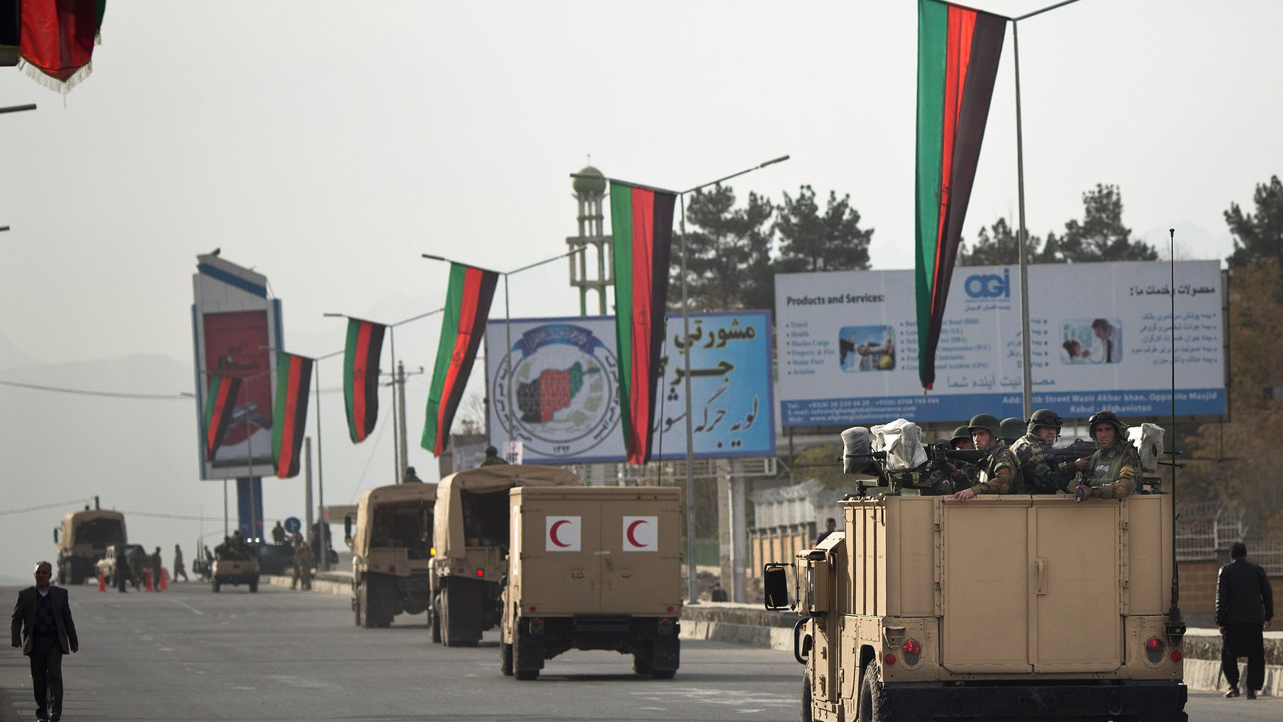 Nov. 18, 2013 - A convoy of Afghan soldiers moves into the area where the Loya Jirga will take place later this week in Kabul, Afghanistan. Security stepped up after a blast on Nov. 16. Thousands of prominent Afghans are scheduled to meet in the Afghan capital to debate a contentious security agreement with the US.