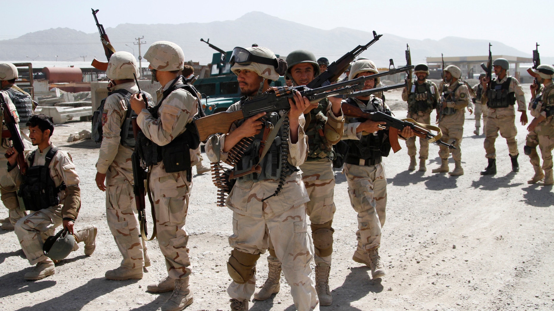 June, 10, 2013 - Afghan military soldiers stand guard as Taliban fighters attacked near Kabul airport, Afghanistan. 7 heavily armed Taliban insurgents launched a pre-dawn attack near Afghanistan's main airport, apparently targeting NATO's airport headquarters.