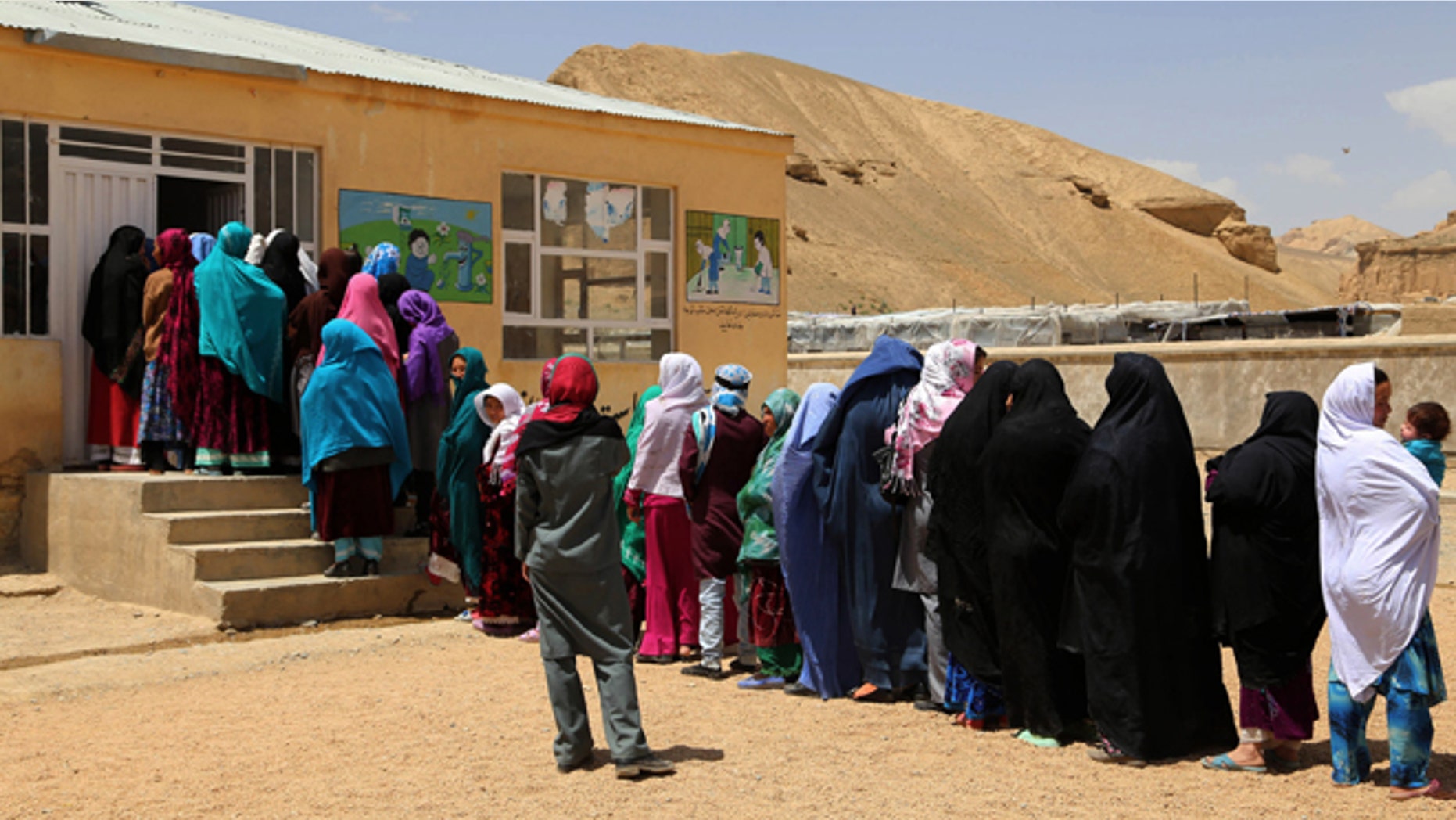 June 14: Despite Taliban threats of violence, many Afghans vow to cast ballots in Saturdayâs presidential runoff vote with hopes that whoever replaces Hamid Karzai will be able to provide security and stability after international forces wind down their combat mission at the end of this year.