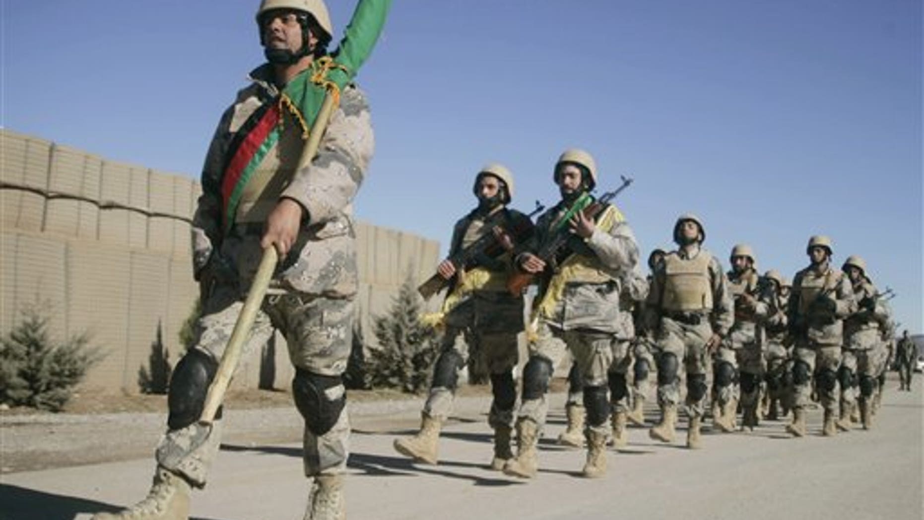 Jan. 16: Afghan border policemen march to attend at the ceremony of transfer of authority from the NATO led International Security Assistance Force troops to Afghan security forces in Guzara, Herat province, west of Kabul, Afghanistan.