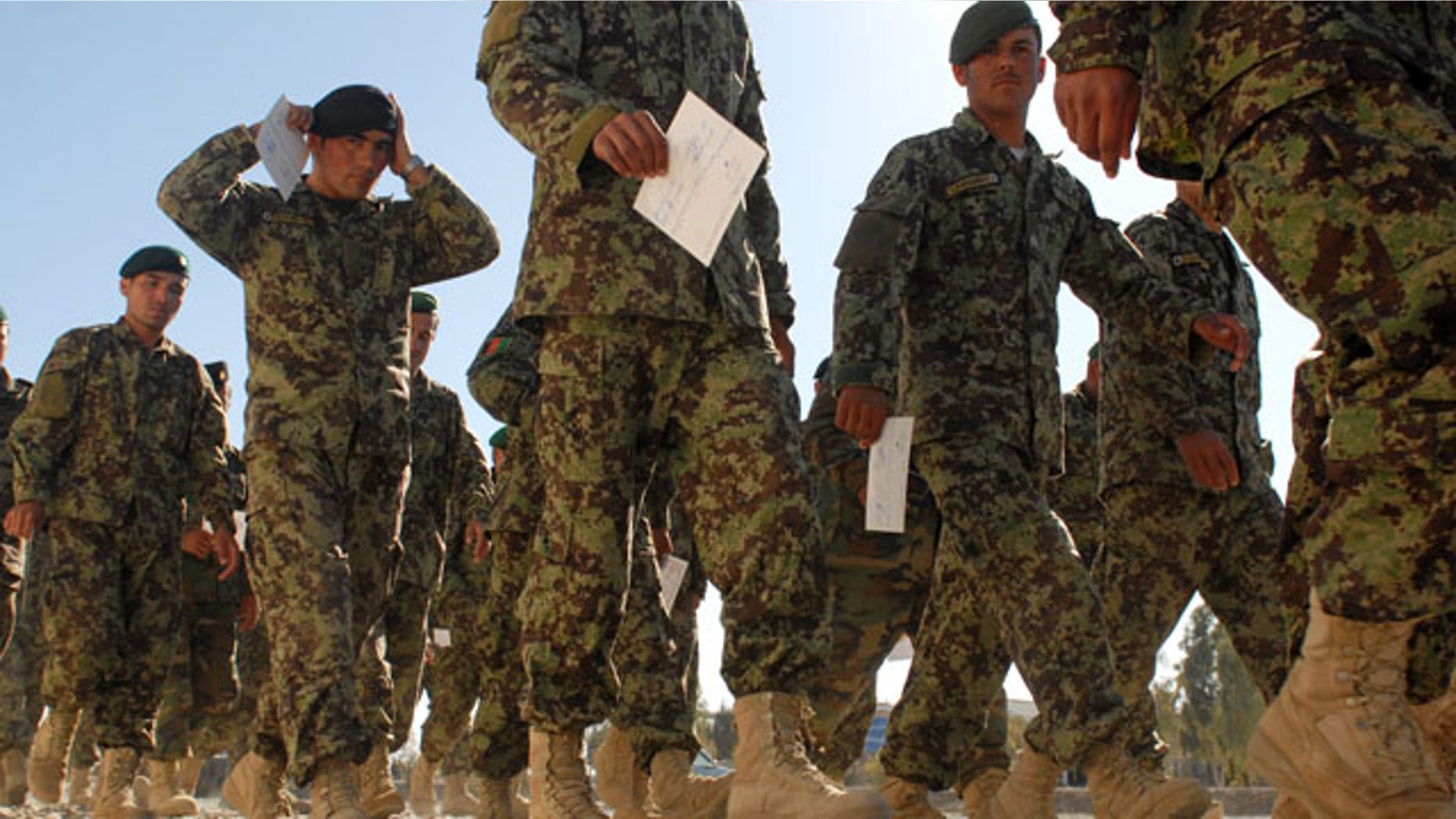 Jan. 6: Afghan National Army soldiers hold their graduation certificates after graduating from a senior-enlisted professional development course in Kandahar, Afghanistan. Officials said Jan. 6 Defense Secretary Robert Gates has decided to send an additional 1,400 Marine combat forces to Afghanistan.