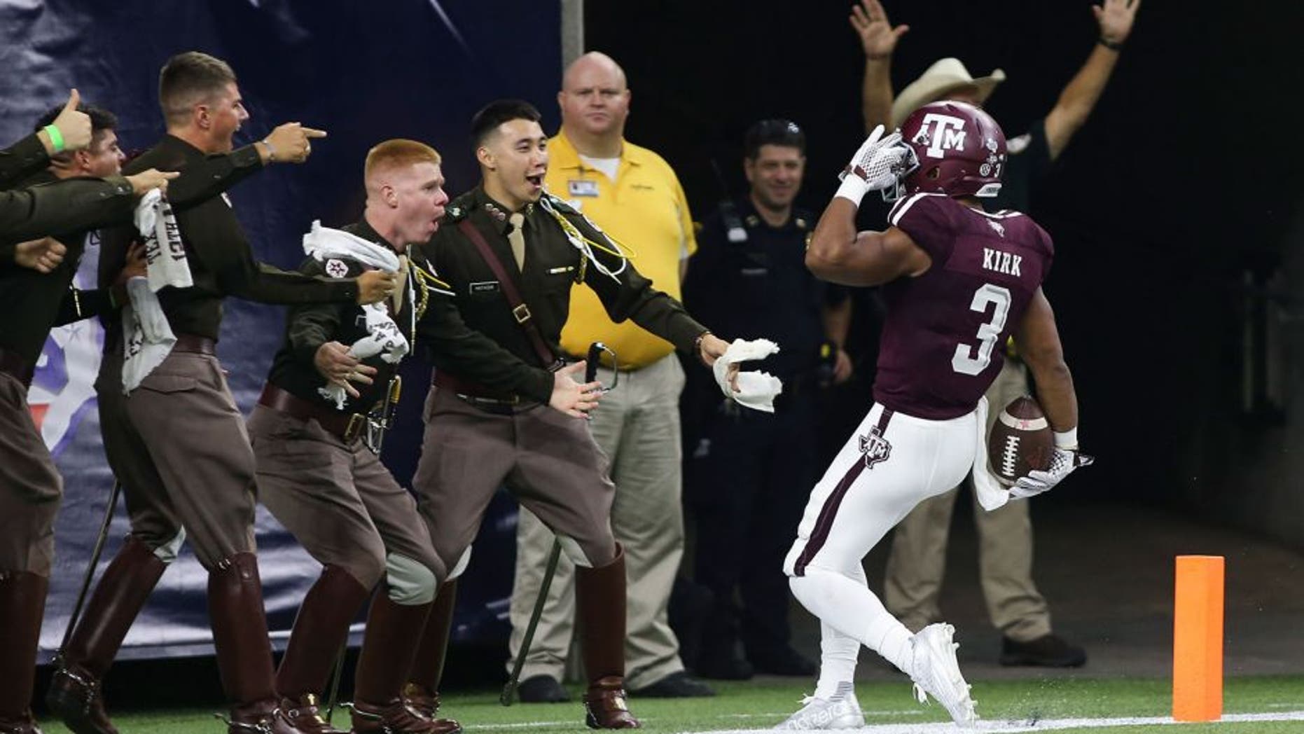 Sep 5, 2015; Houston, TX, USA; Texas A&M Aggies wide receiver Christian Kirk (3) salutes after returning a punt for a touchdown during the second quarter against the Arizona State Sun Devils at NRG Stadium. Mandatory Credit: Troy Taormina-USA TODAY Sports