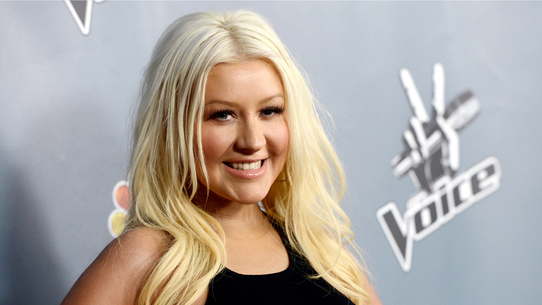 Singer Christina Aguilera arrives at a screening of NBC's "The Voice" Season 4 at the Chinese Theatre on March 20, 2013 in Los Angeles, California. (Photo by Kevin Winter/Getty Images)