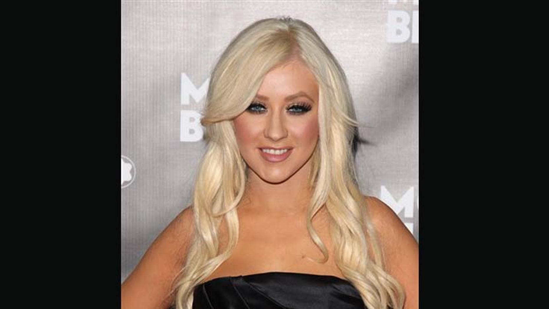 Christina Aguilera asiste al lanzamiento del instrumento de escritura John Lennon de Montblanc, el 12 de septiembre del 2010 en Nueva York. La cantante develará una estrella en el Paseo de la Fama de Hollywood el lunes 15 de noviembre del 2010. (AP Foto/Peter Kramer, Archivo)